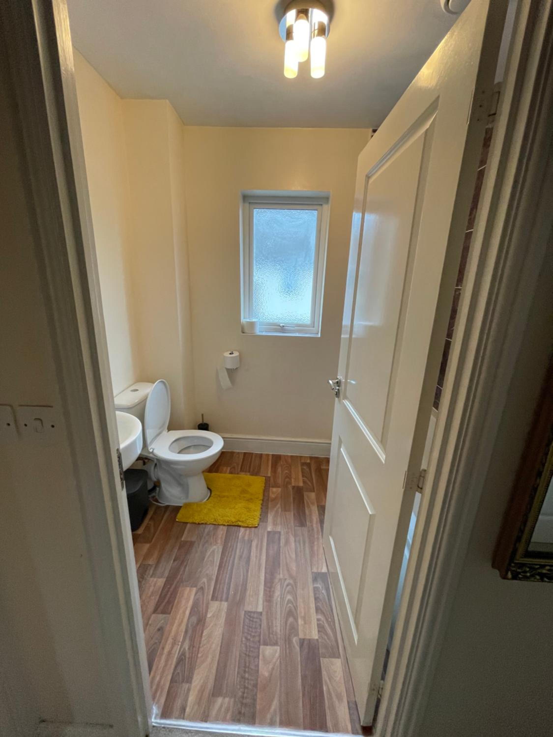 Three-Bedroom House - Photo 4