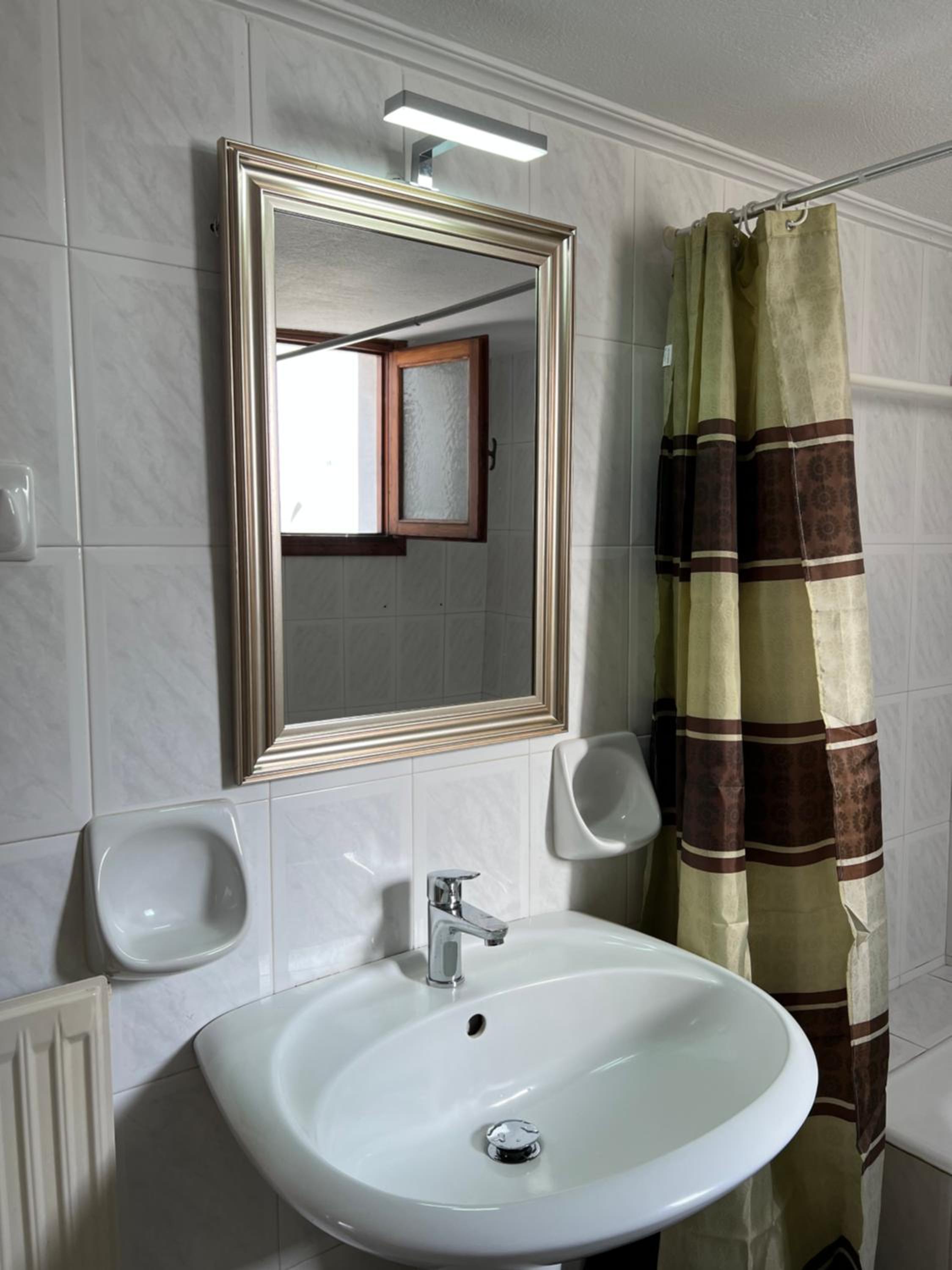 Three-Bedroom House - Photo 5