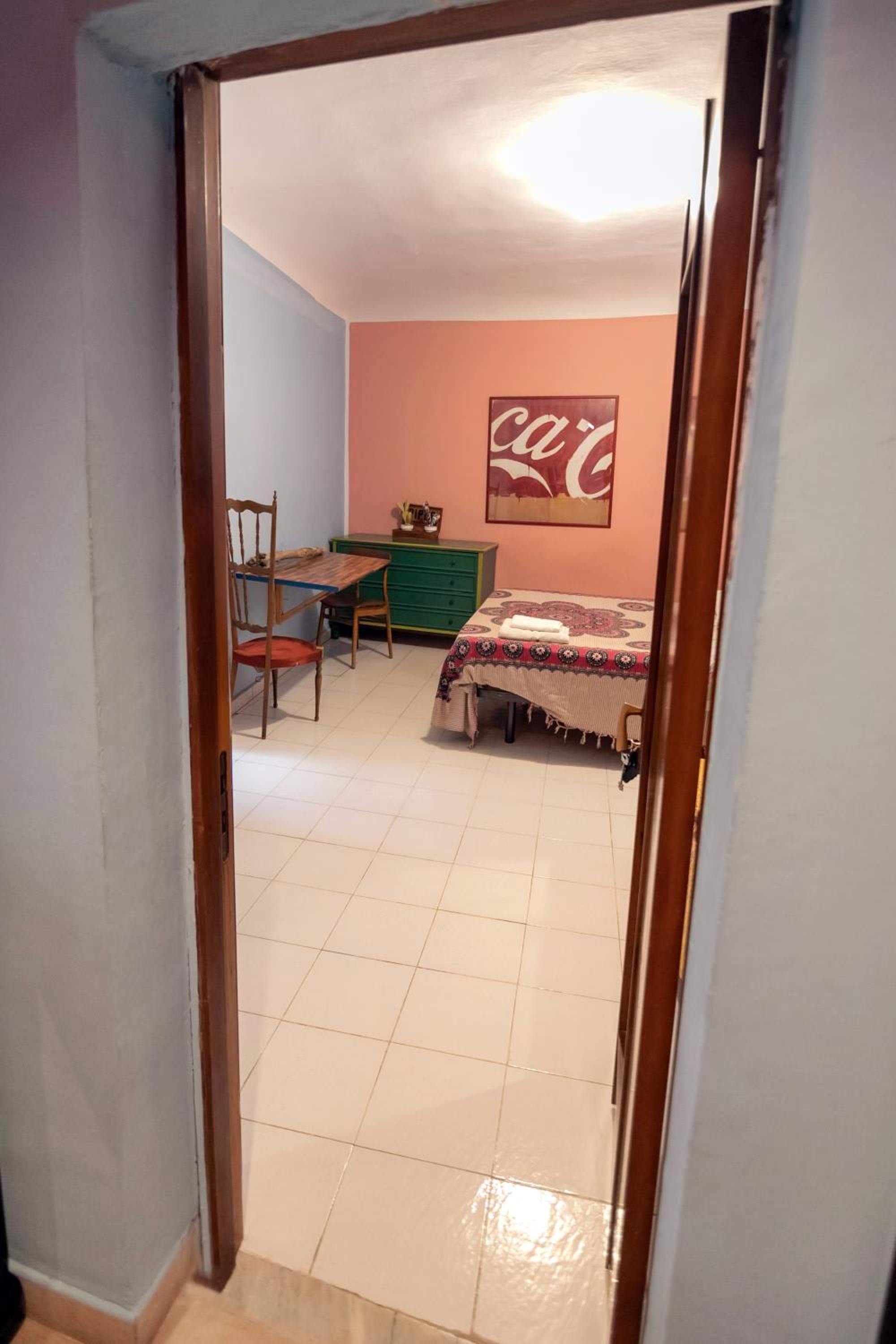 Economy Quadruple Room With Shared Bathroom