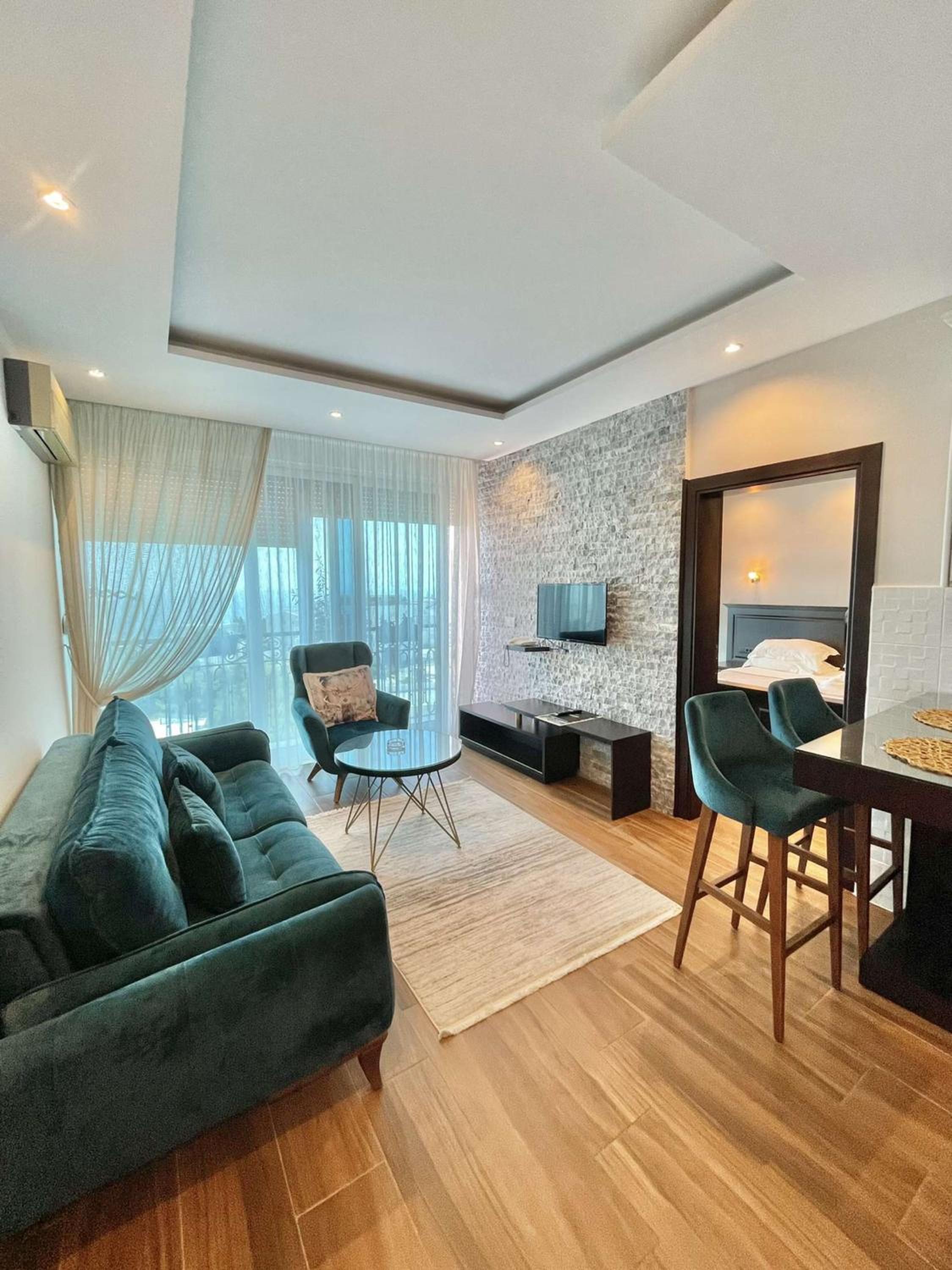 One-Bedroom Apartment with Balcony and Sea View