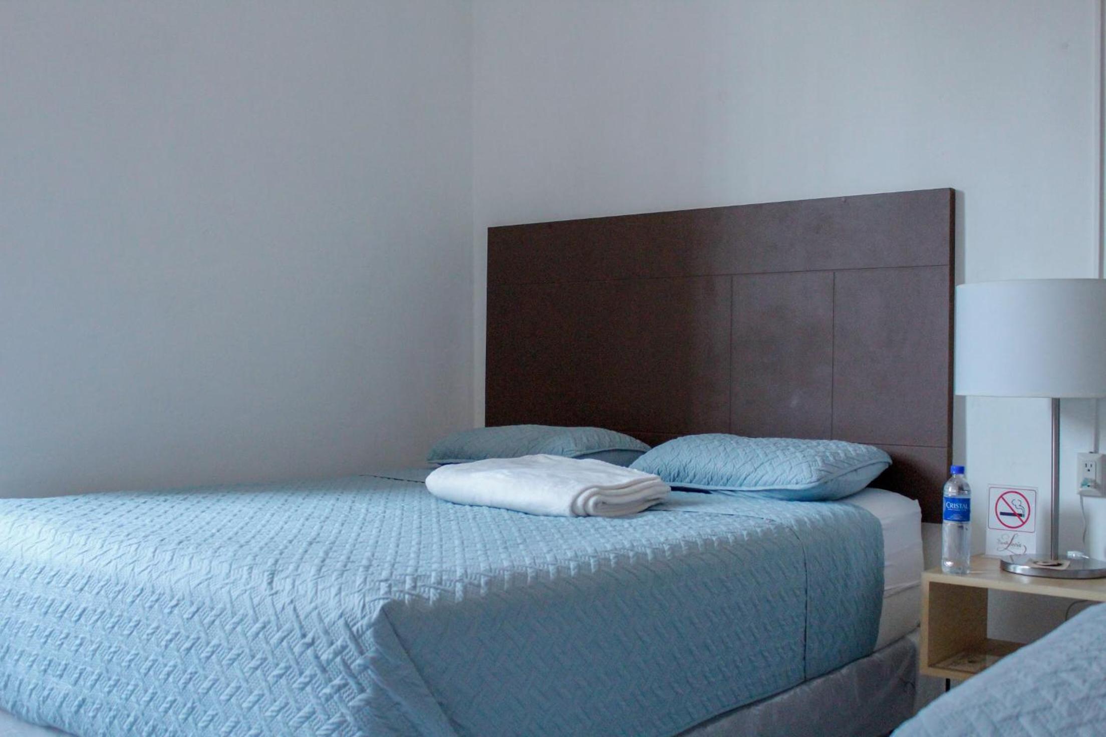 Habitación Estándar con Cama Queen