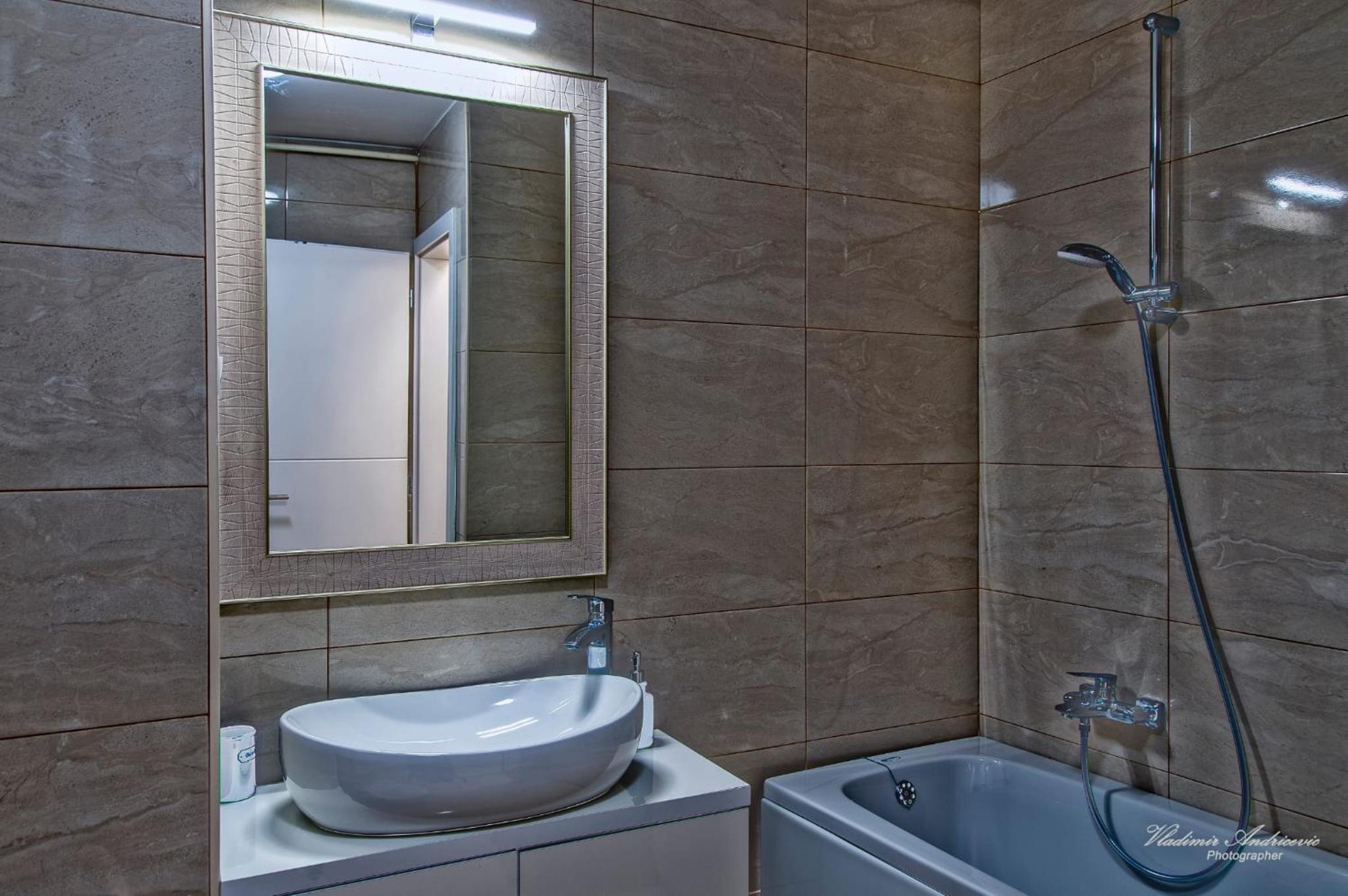 Three-Bedroom Apartment - Photo 11