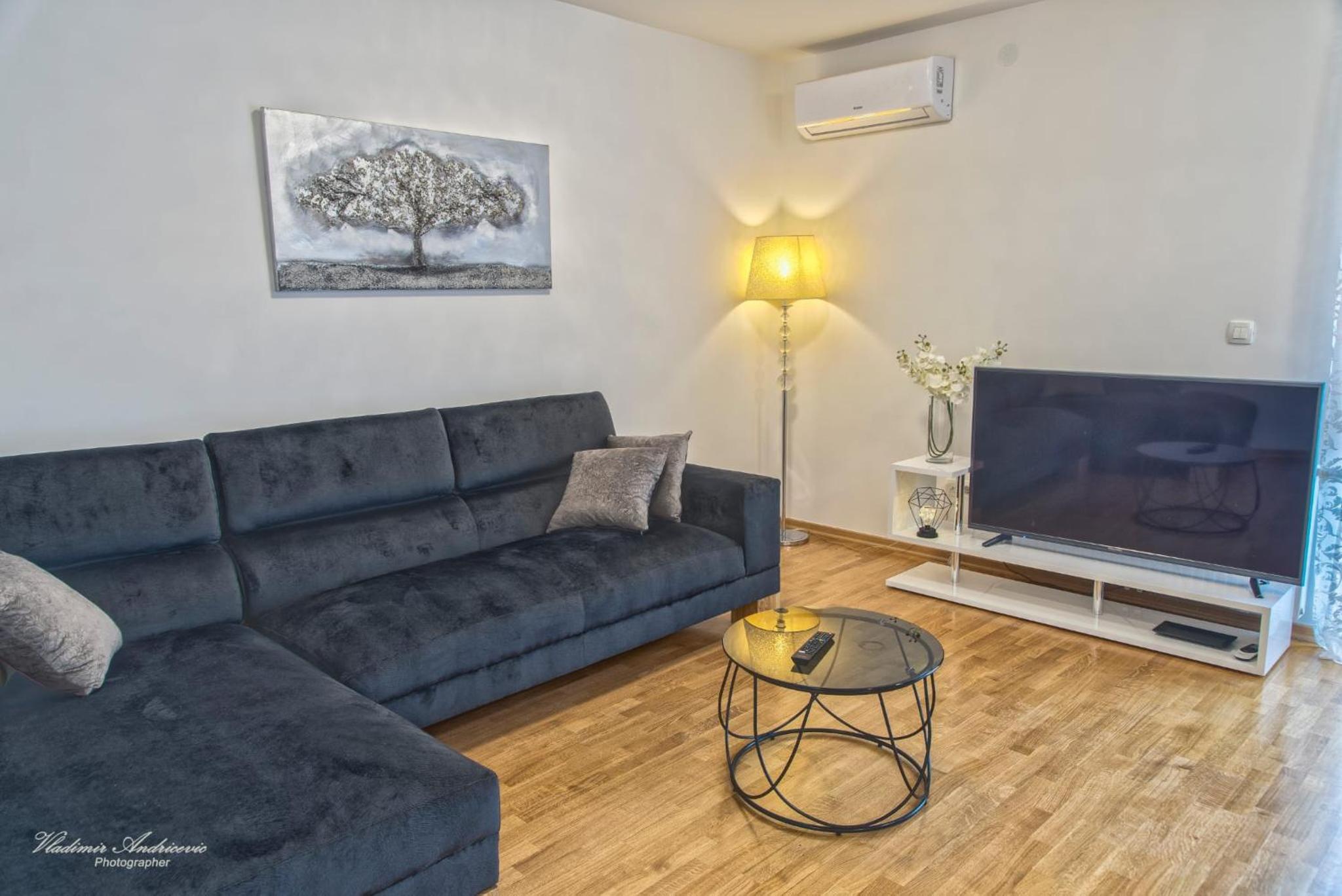Three-Bedroom Apartment - Photo 2
