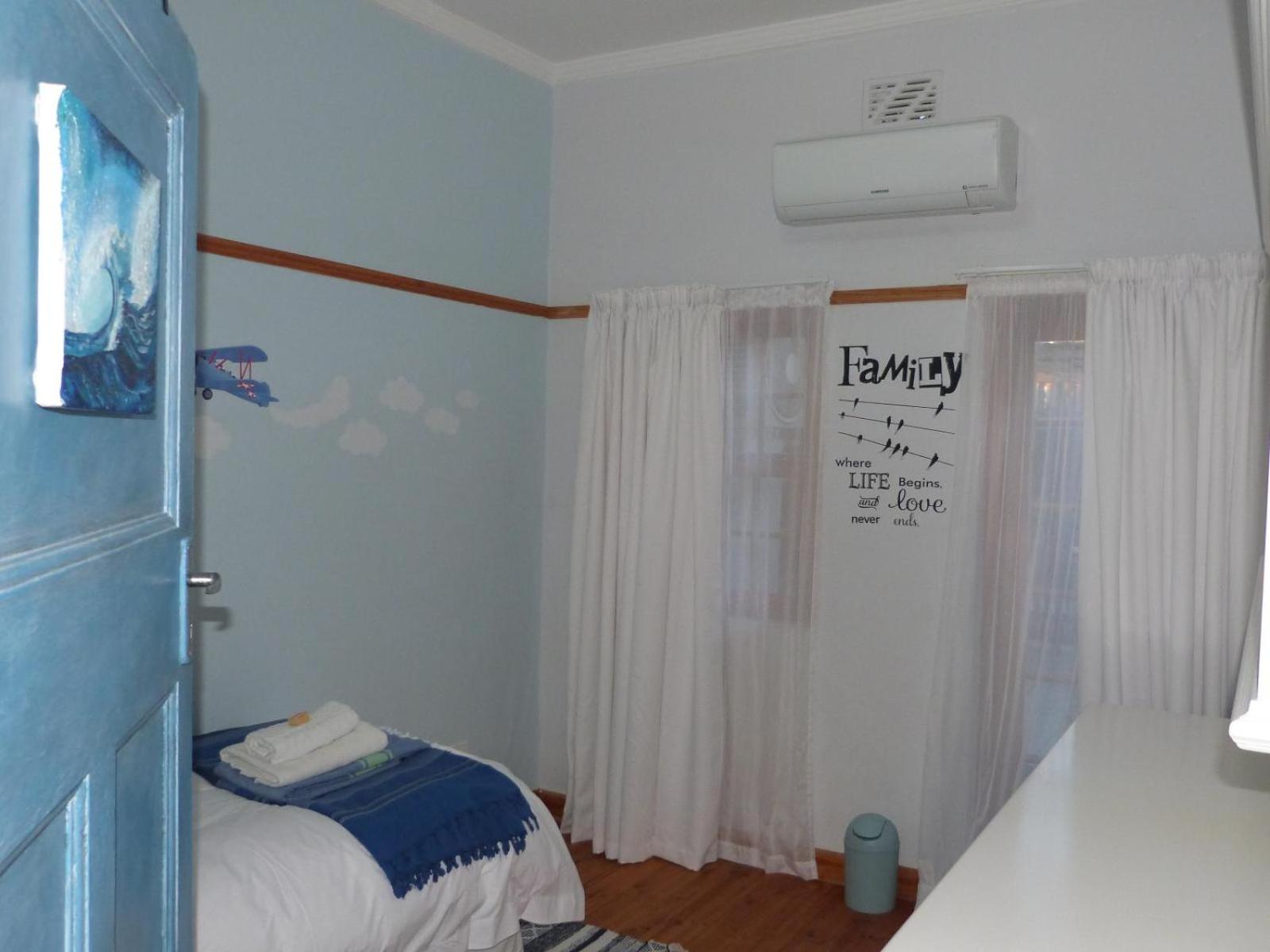 Three-Bedroom House - Photo 35