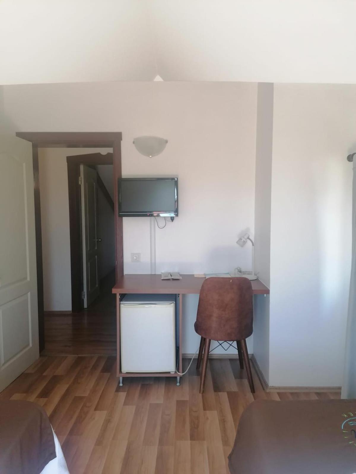 Deluxe Quadruple Room - Photo 8