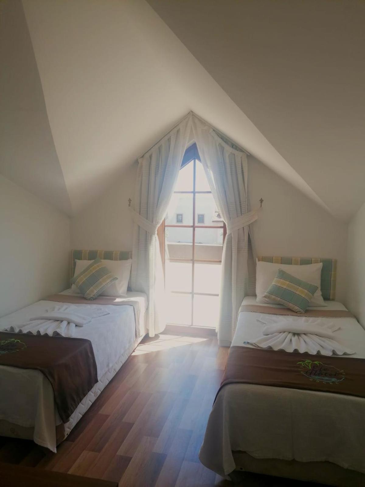 Deluxe Quadruple Room - Photo 5