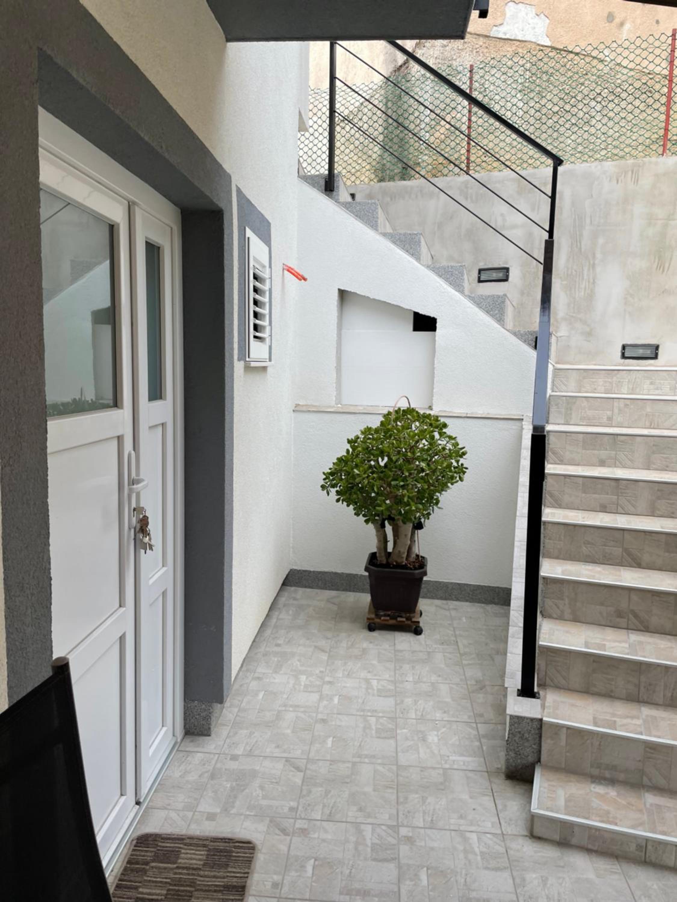 Two-Bedroom Apartment - Photo 21