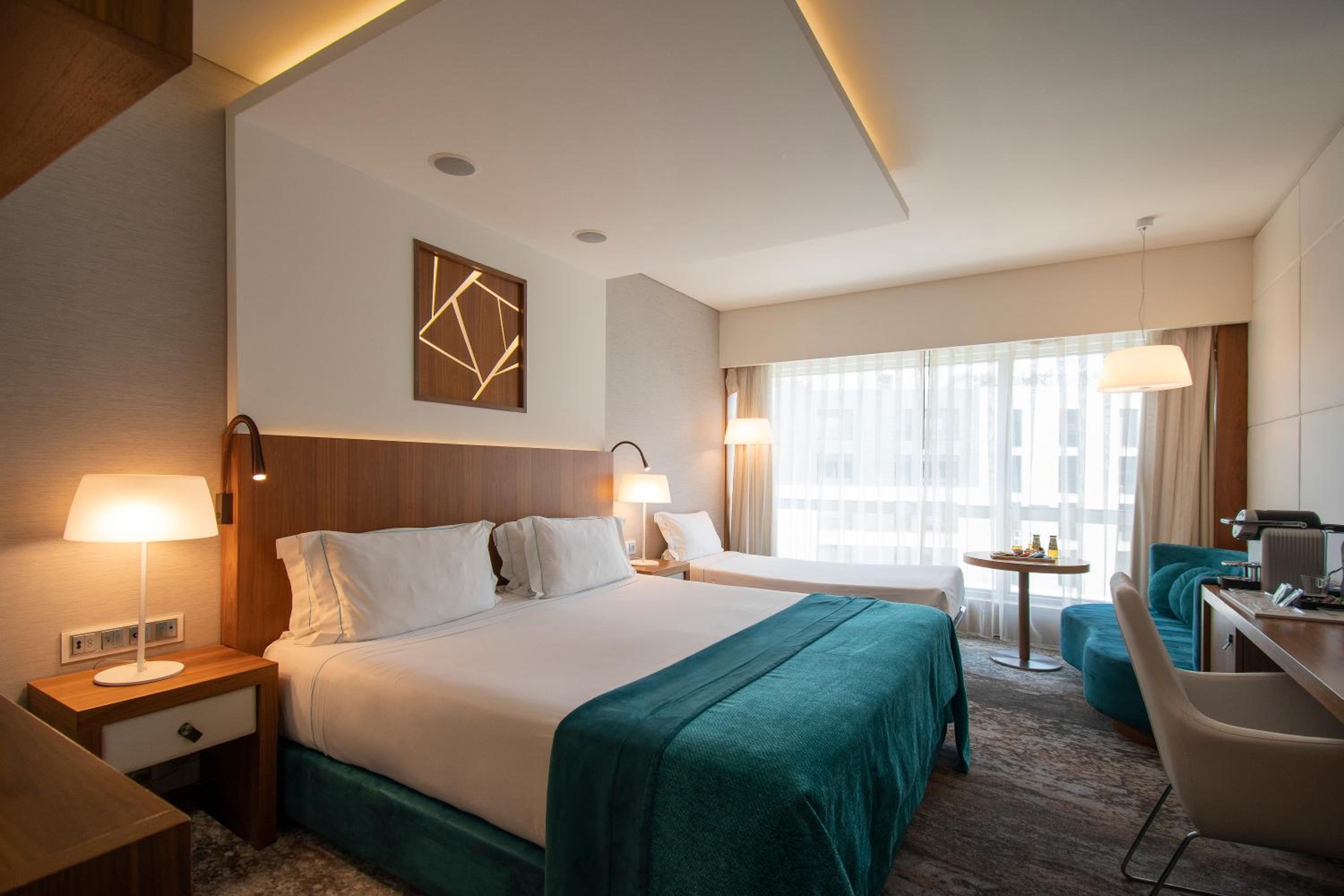 Deluxe Double Room with Extra Bed (2 Adults + 1 child up to 12 years old)