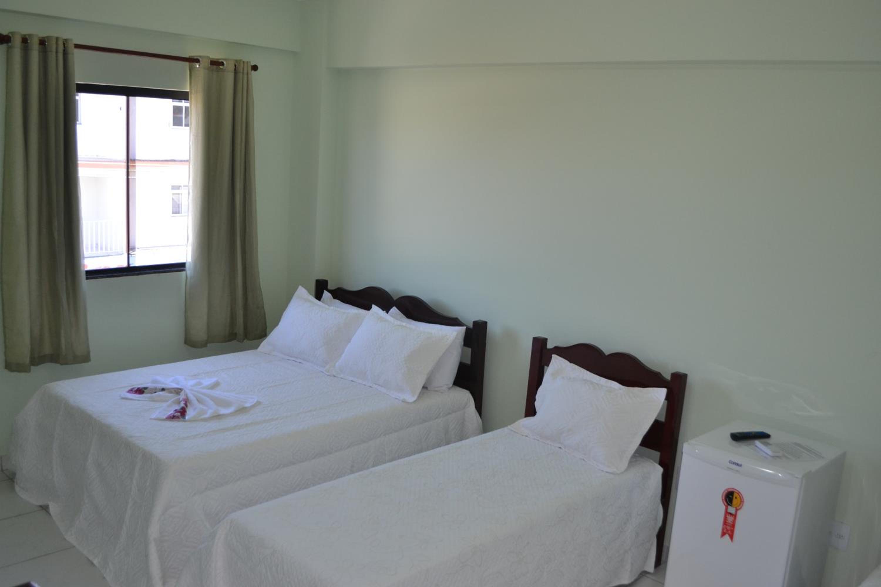 Deluxe with 01 Double Bed and 02 Single Beds photo 2
