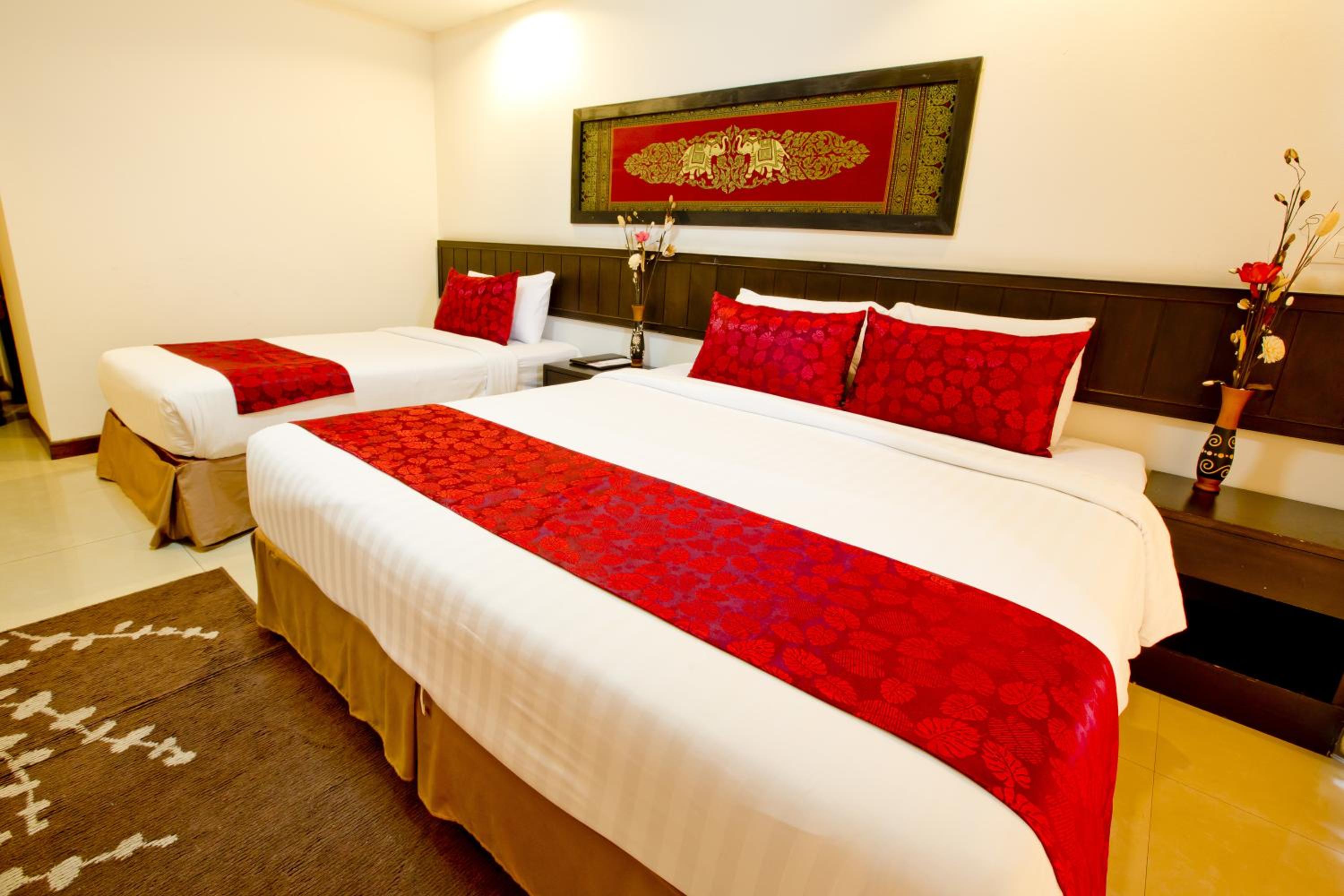 Deluxe Triple Room - Photo 8
