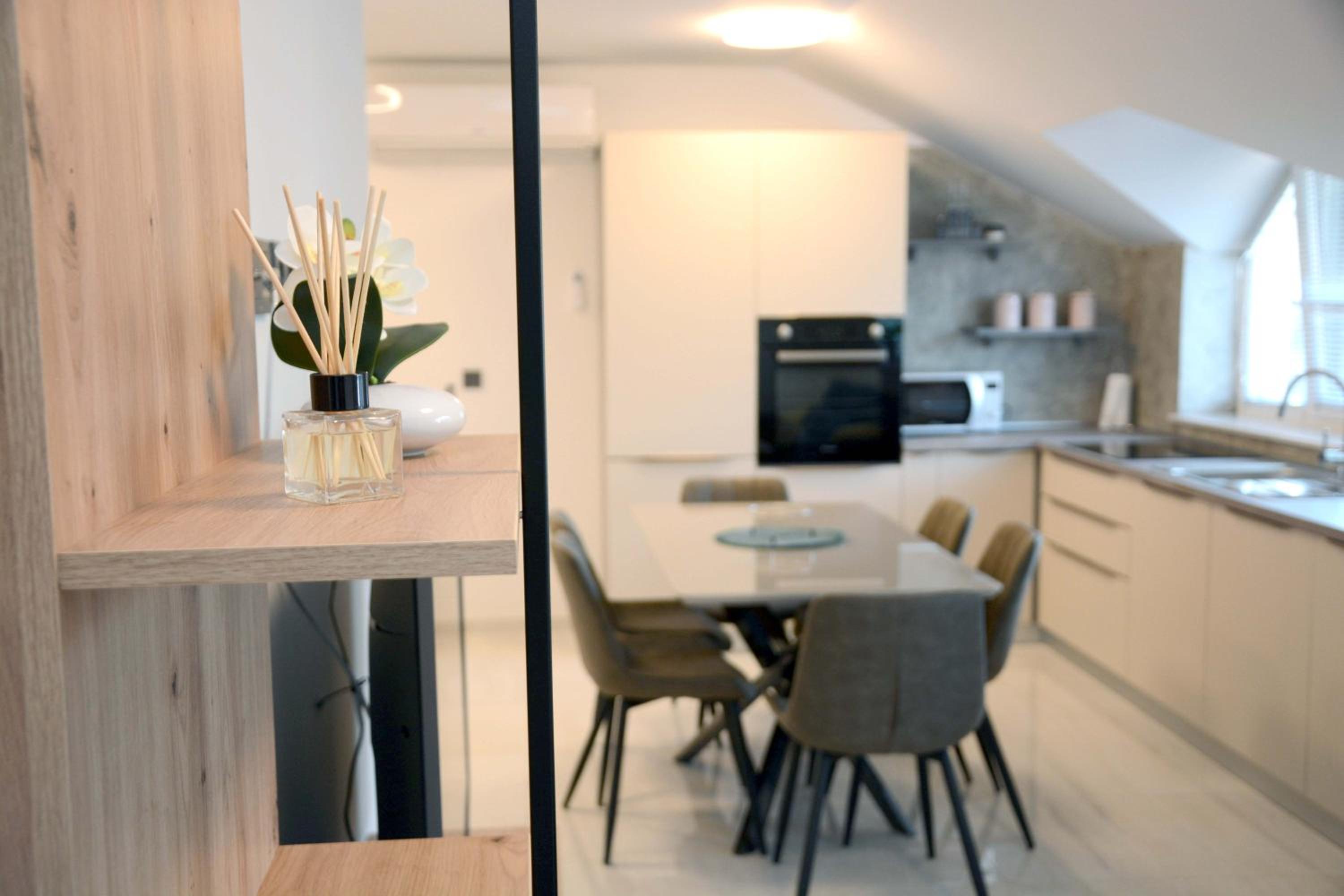 Three-Bedroom Apartment - Photo 12