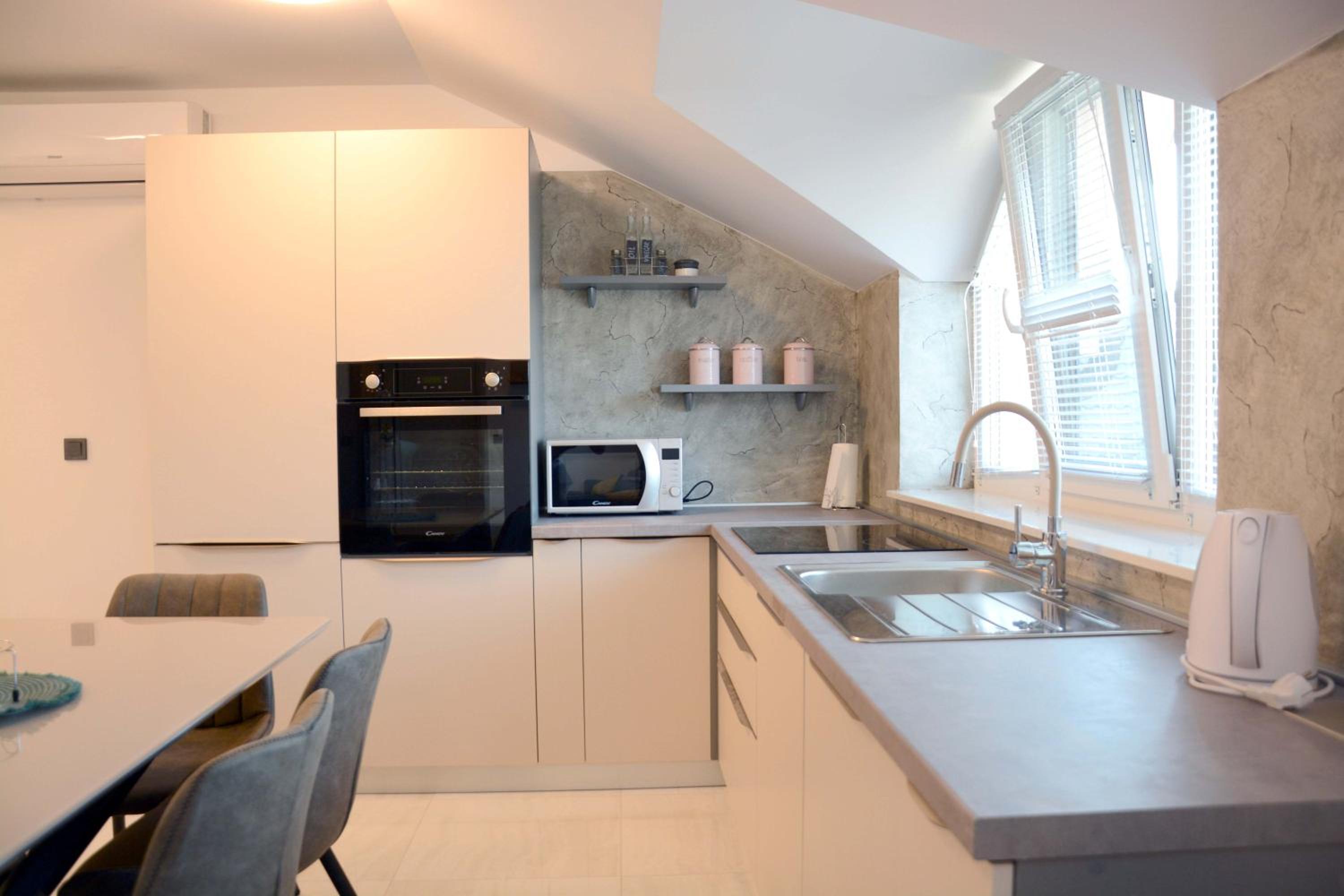 Three-Bedroom Apartment - Photo 35