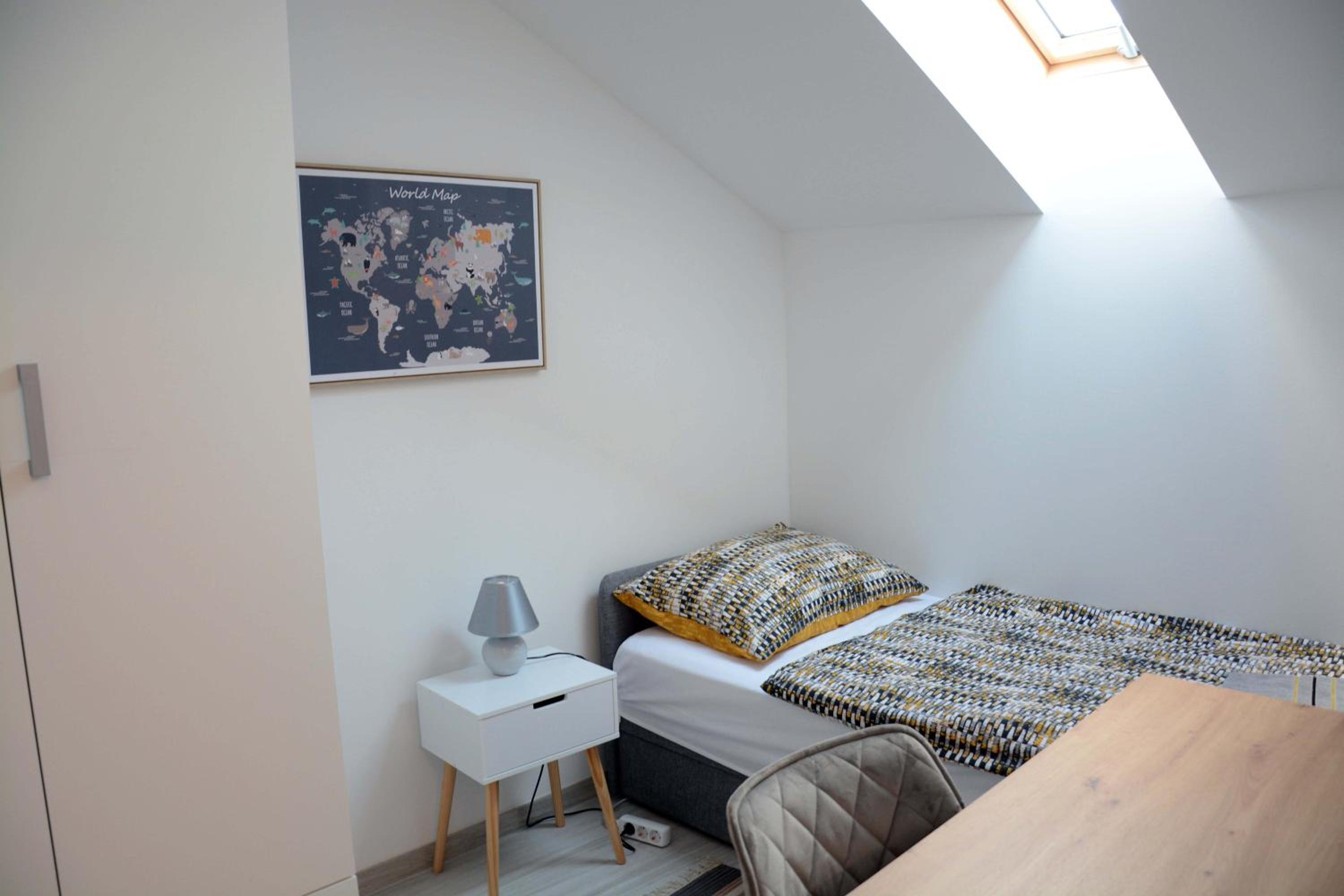 Three-Bedroom Apartment - Photo 23