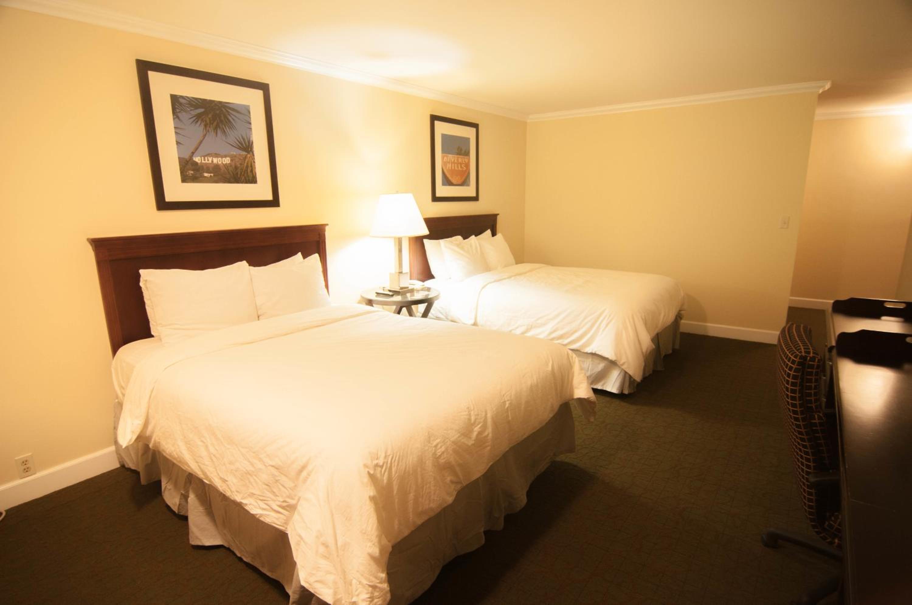 Deluxe Queen Room with Two Queen Beds with Balcony - Photo 1