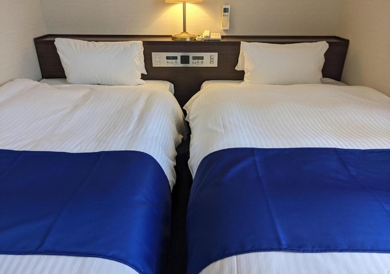Economy Twin Room - Non-Smoking - Photo 1