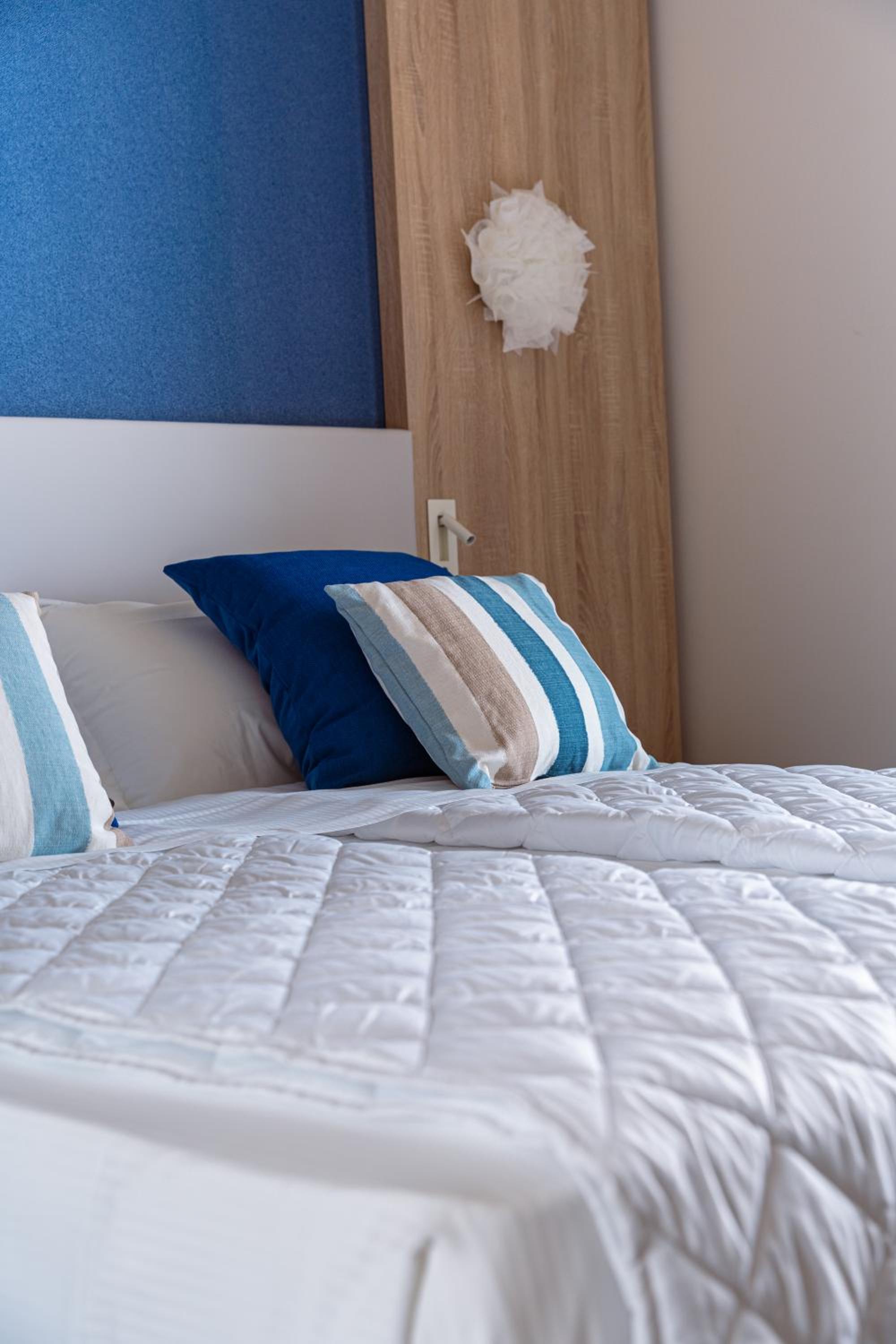 Standard Triple Room with Side Sea View