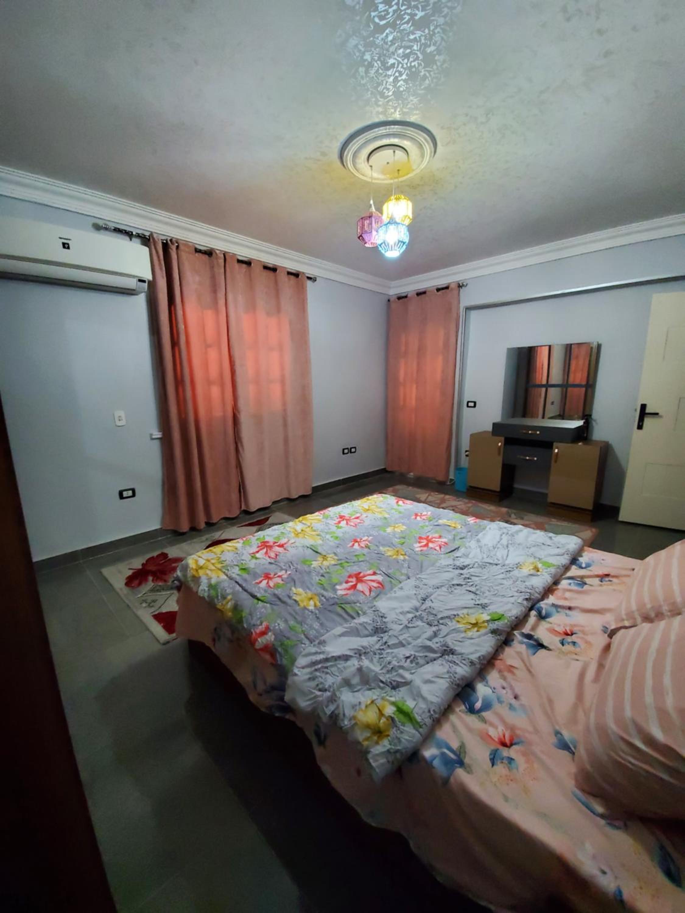 Three-Bedroom Apartment - Photo 16