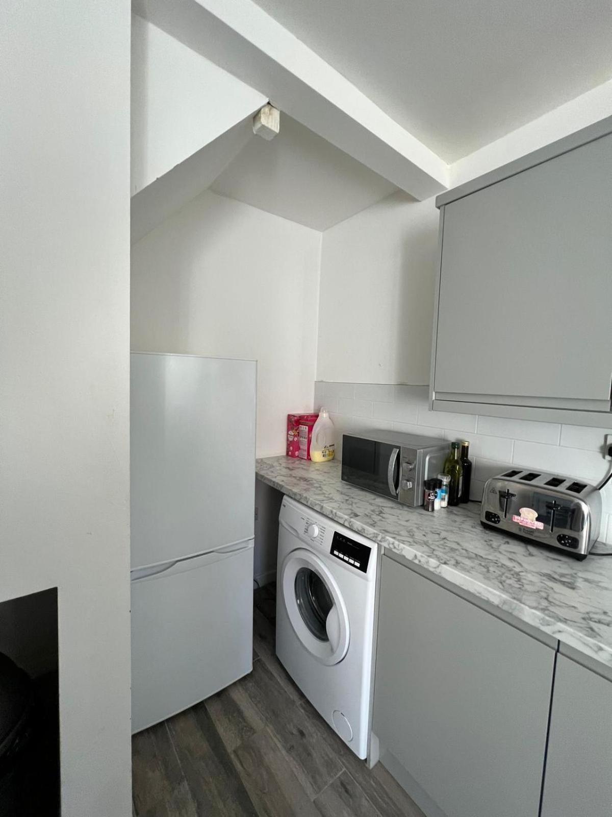 Three-Bedroom House - Photo 46