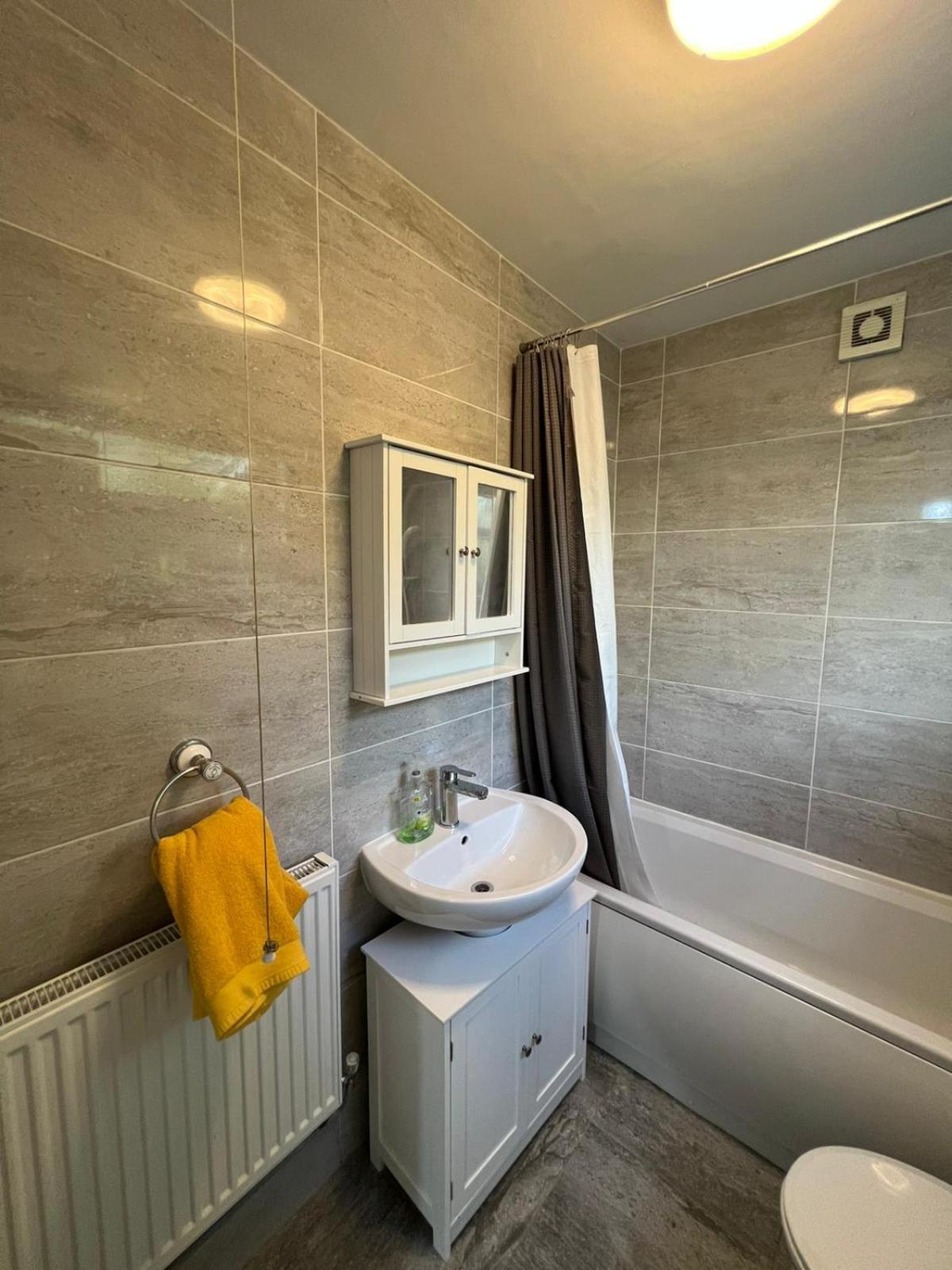 Three-Bedroom House - Photo 16