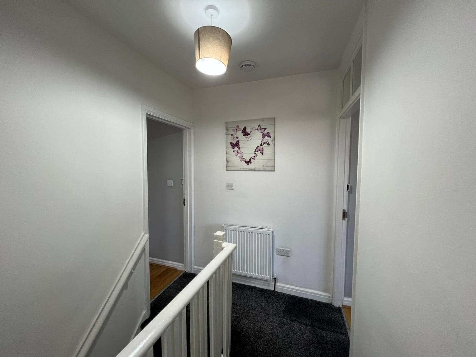 Three-Bedroom House - Photo 19