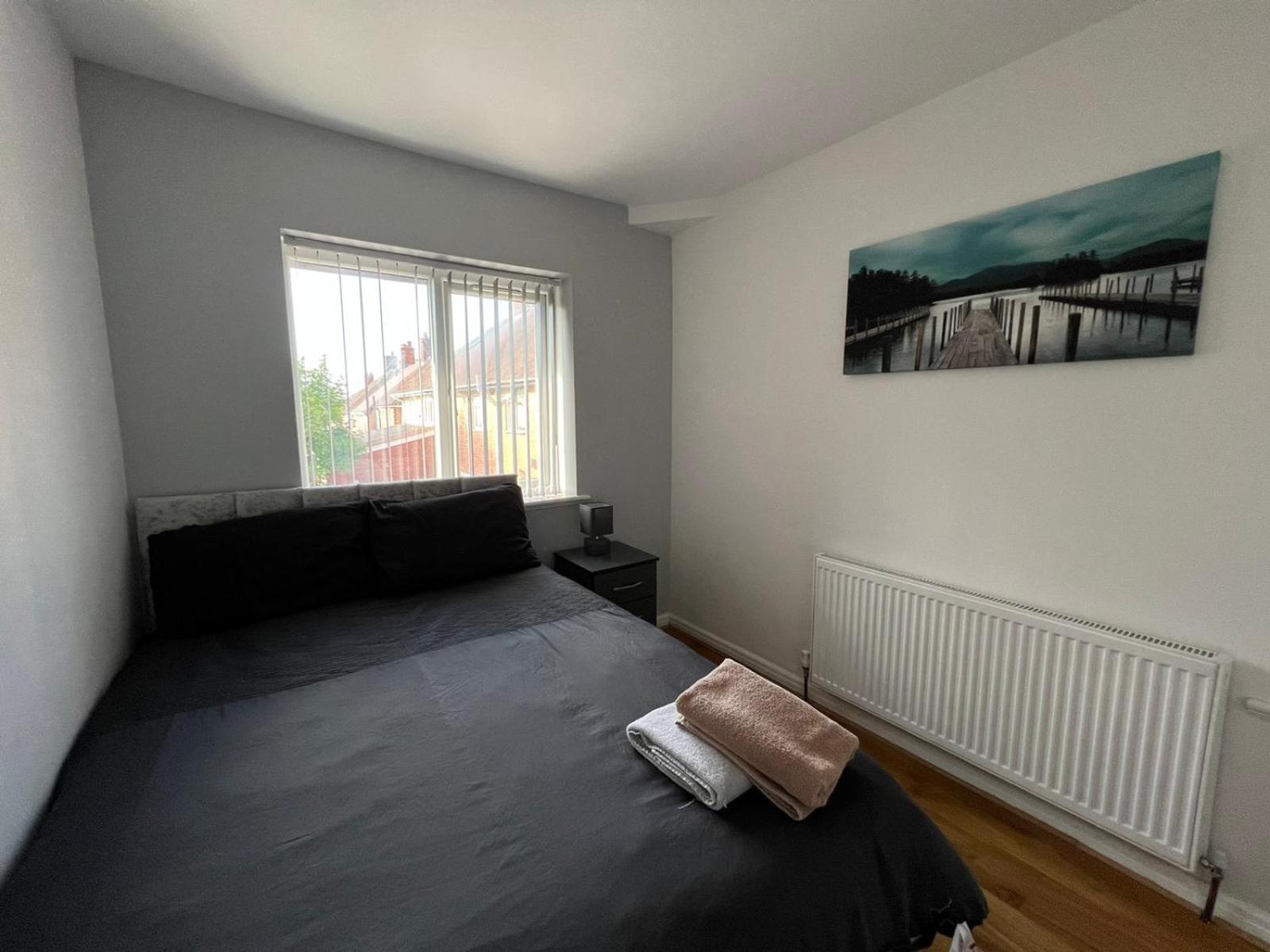 Three-Bedroom House - Photo 26