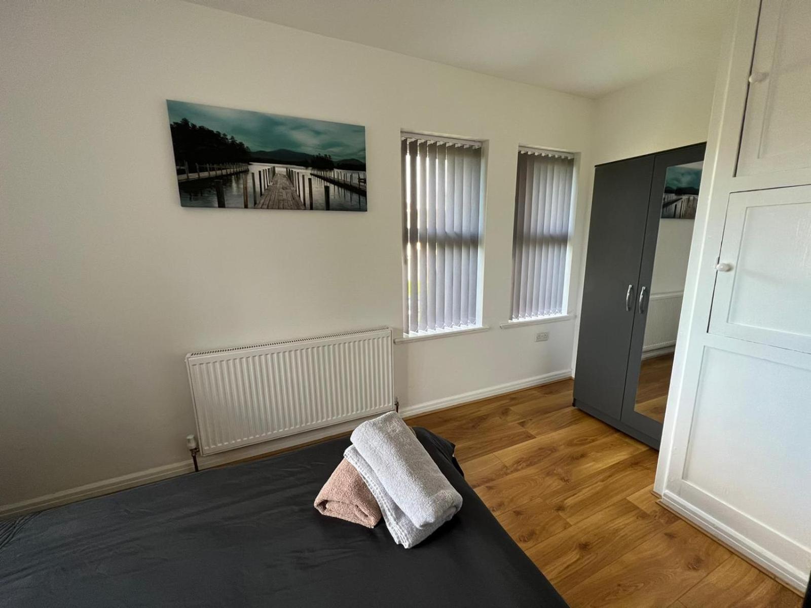 Three-Bedroom House - Photo 27