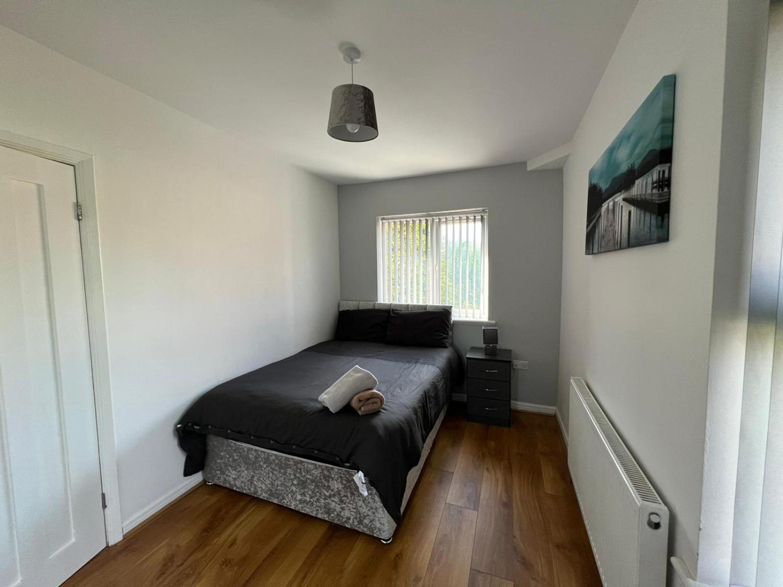 Three-Bedroom House - Photo 28