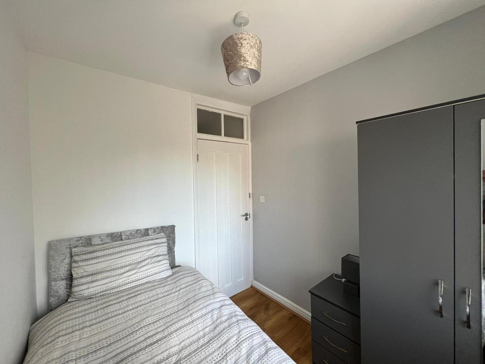 Three-Bedroom House - Photo 29