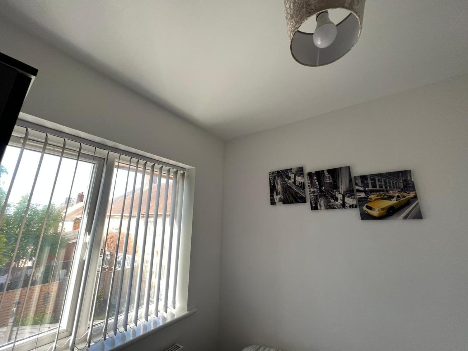 Three-Bedroom House - Photo 30