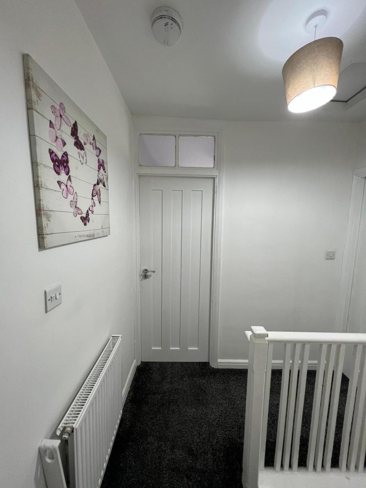 Three-Bedroom House - Photo 43