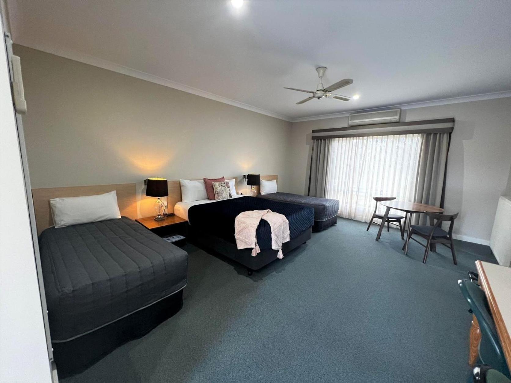 Deluxe Quadruple Room - Photo 1