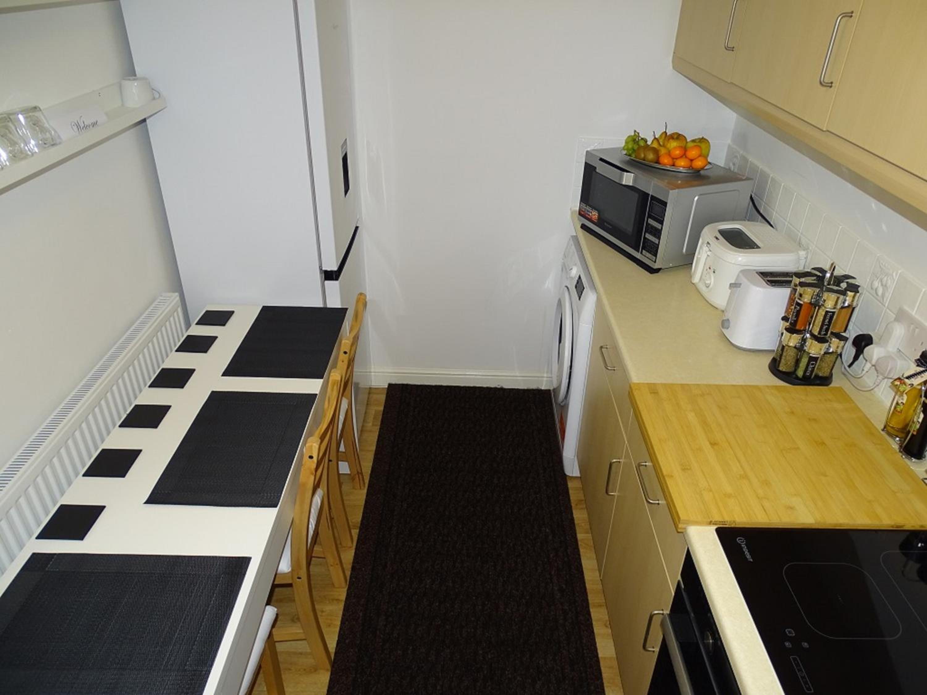 Three-Bedroom Apartment - Photo 33