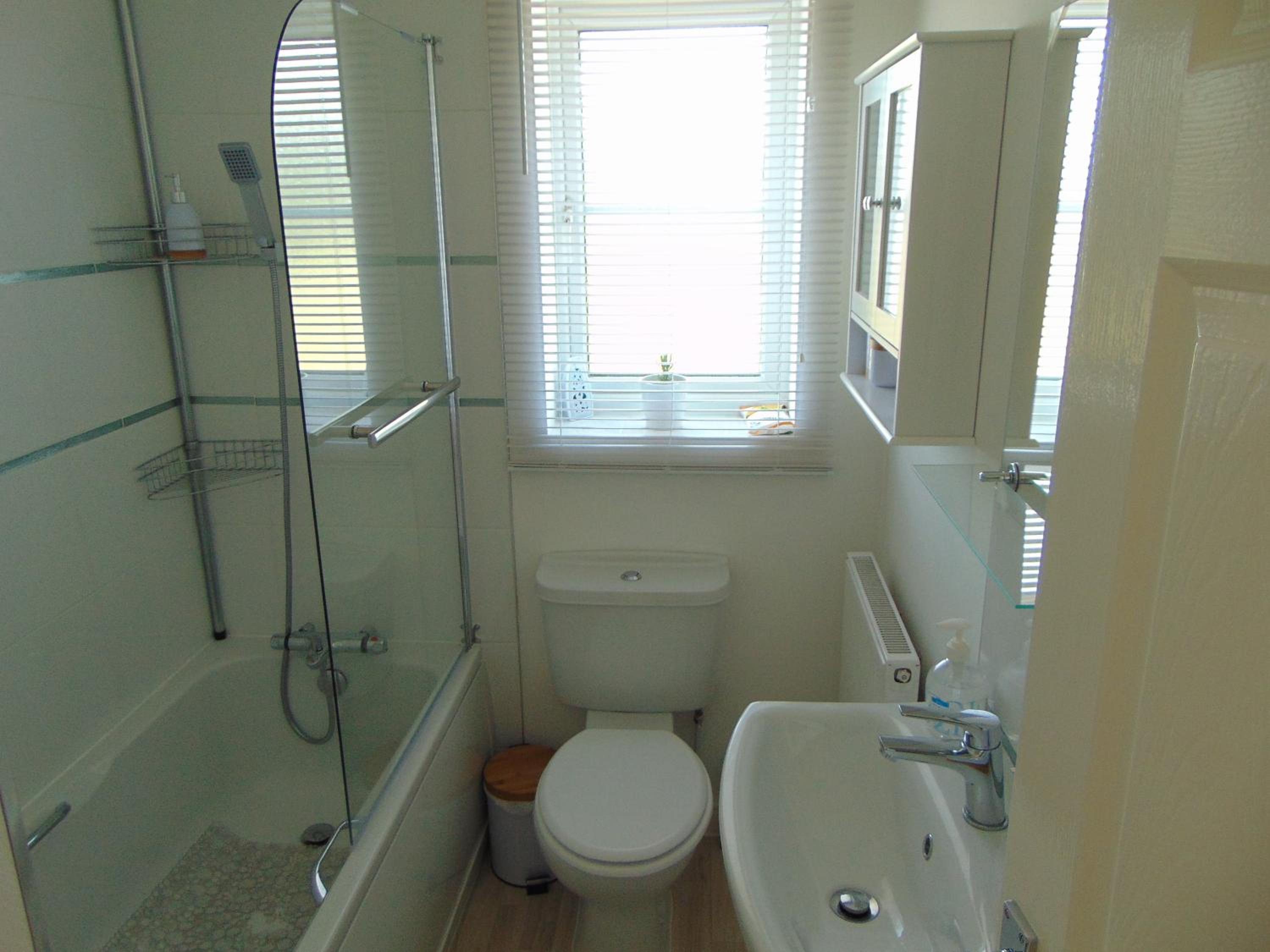 Three-Bedroom Apartment - Photo 26