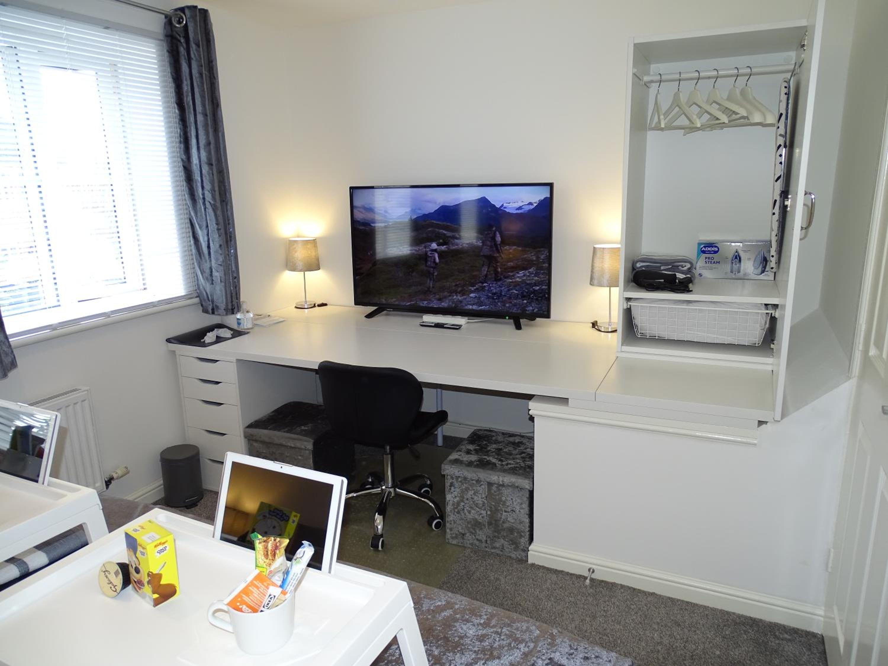 Three-Bedroom Apartment - Photo 23