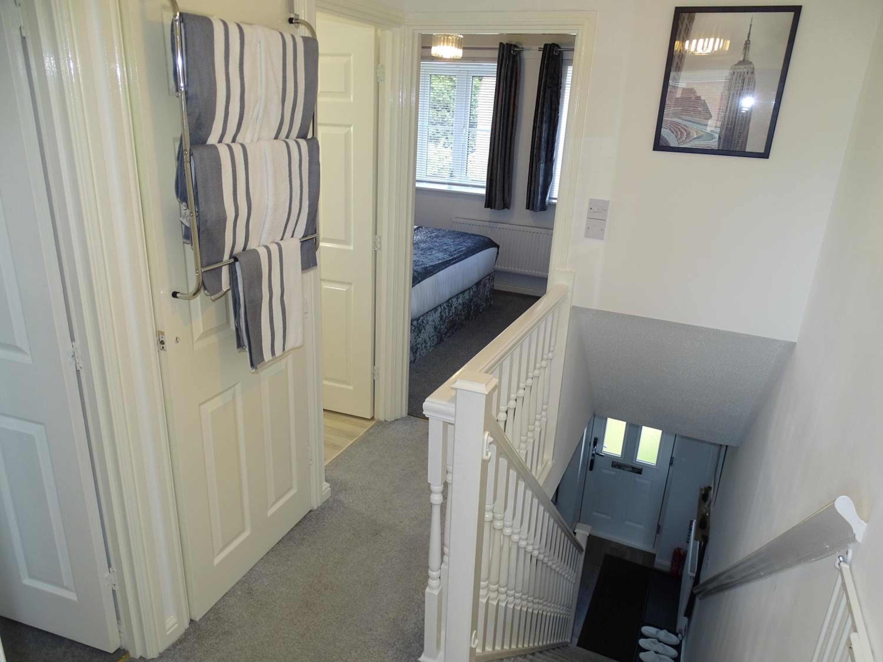 Three-Bedroom Apartment - Photo 20