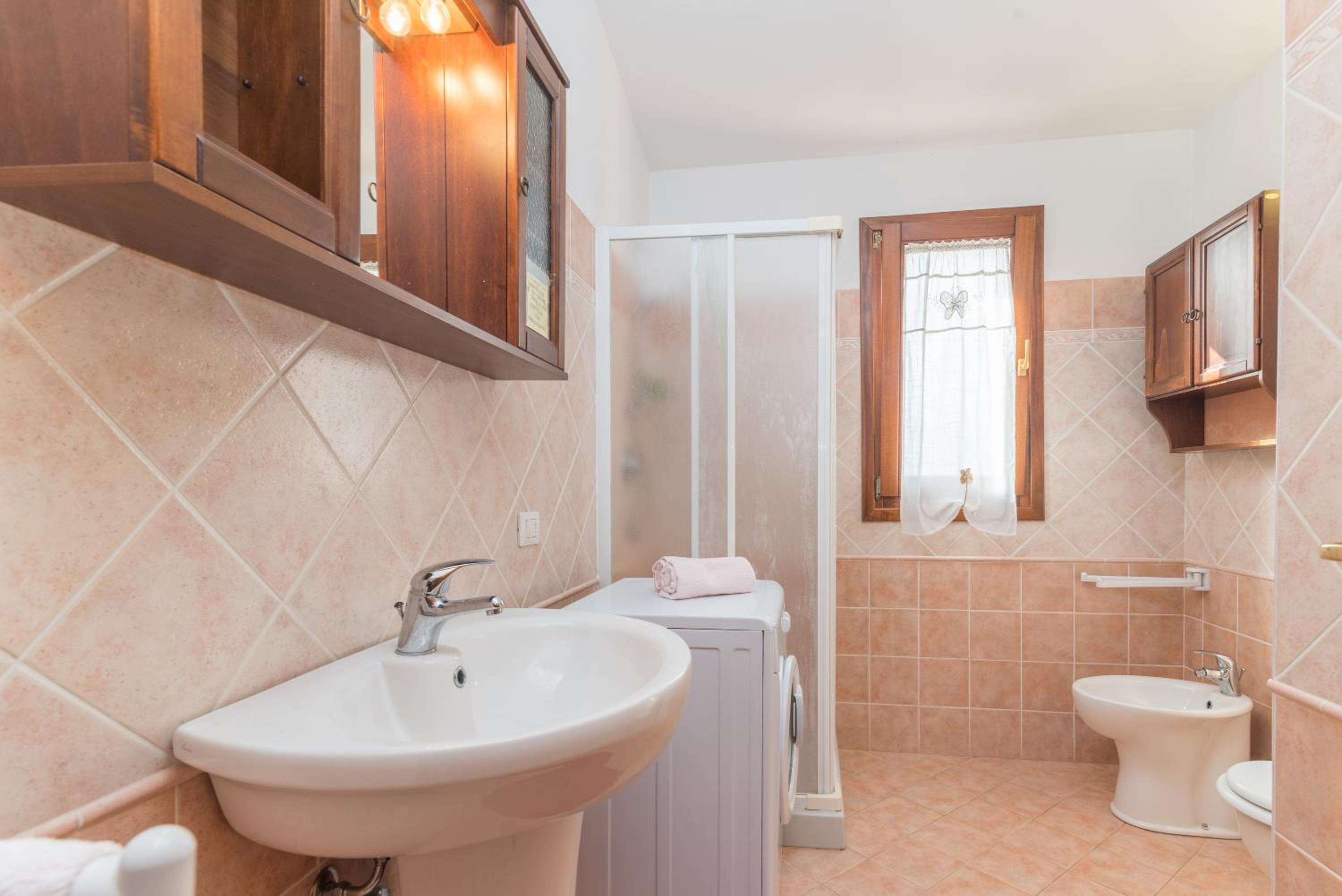 Three-Bedroom House - Photo 24