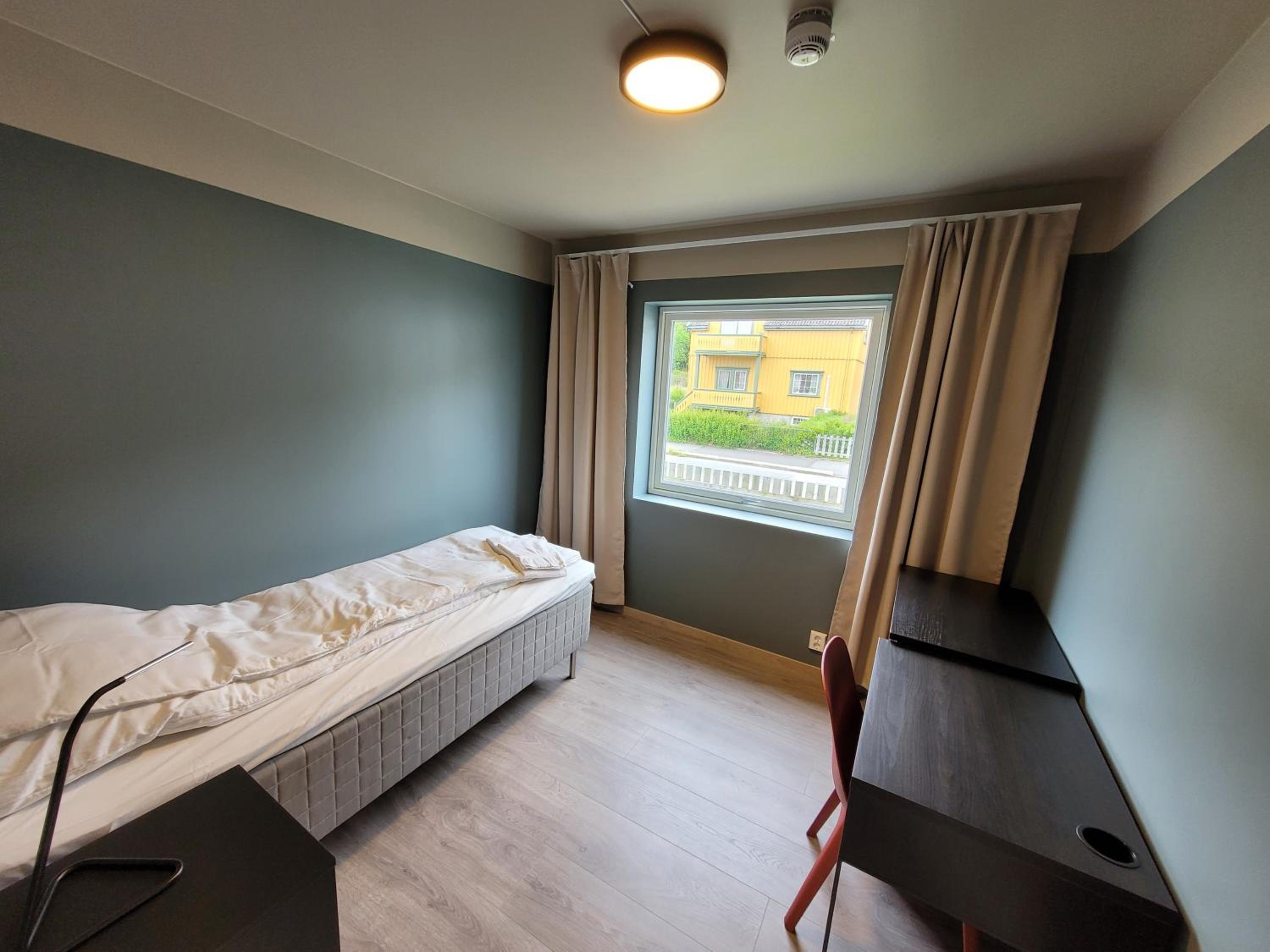 Three-Bedroom Apartment - Photo 10