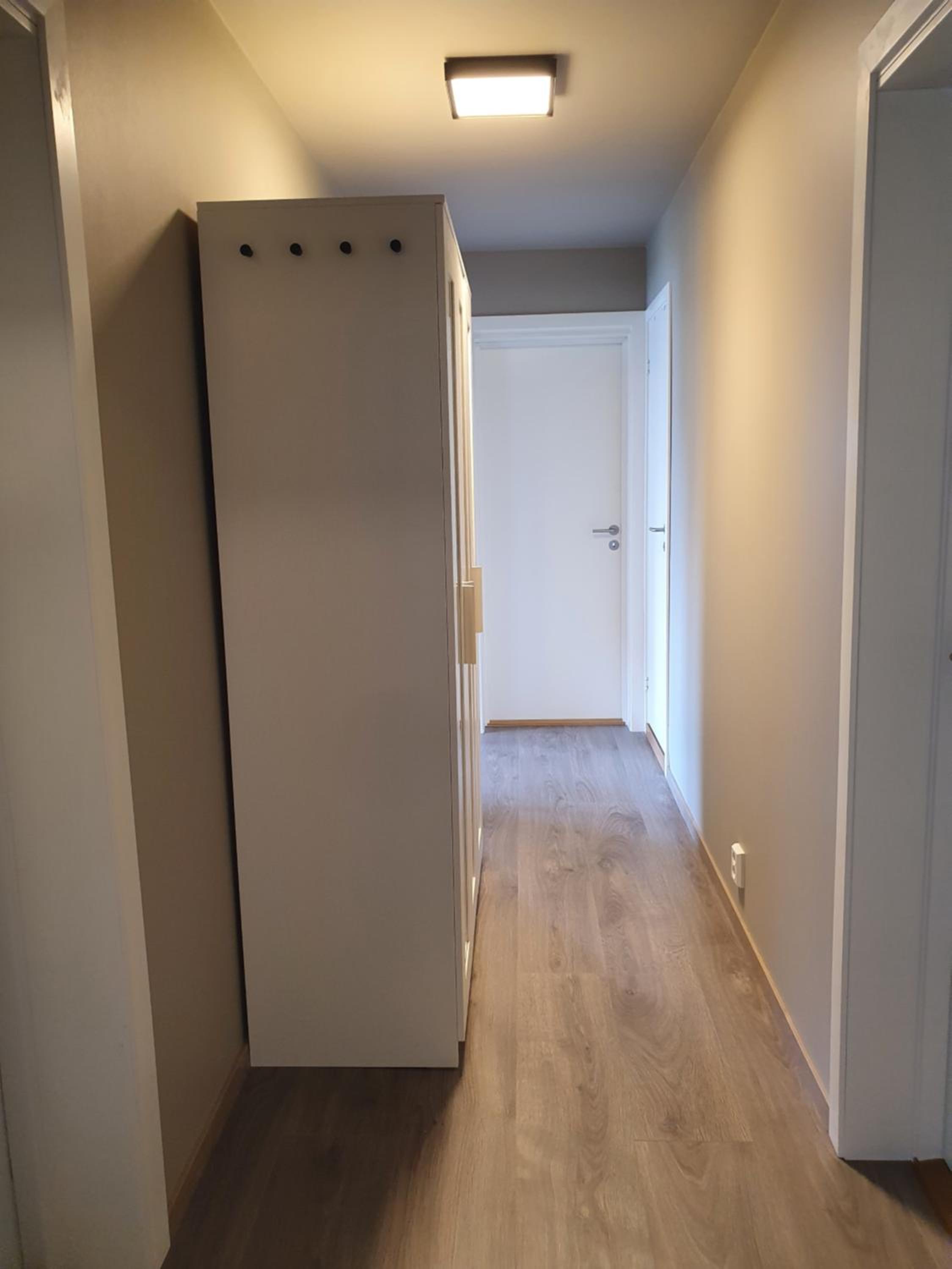 Three-Bedroom Apartment - Photo 12