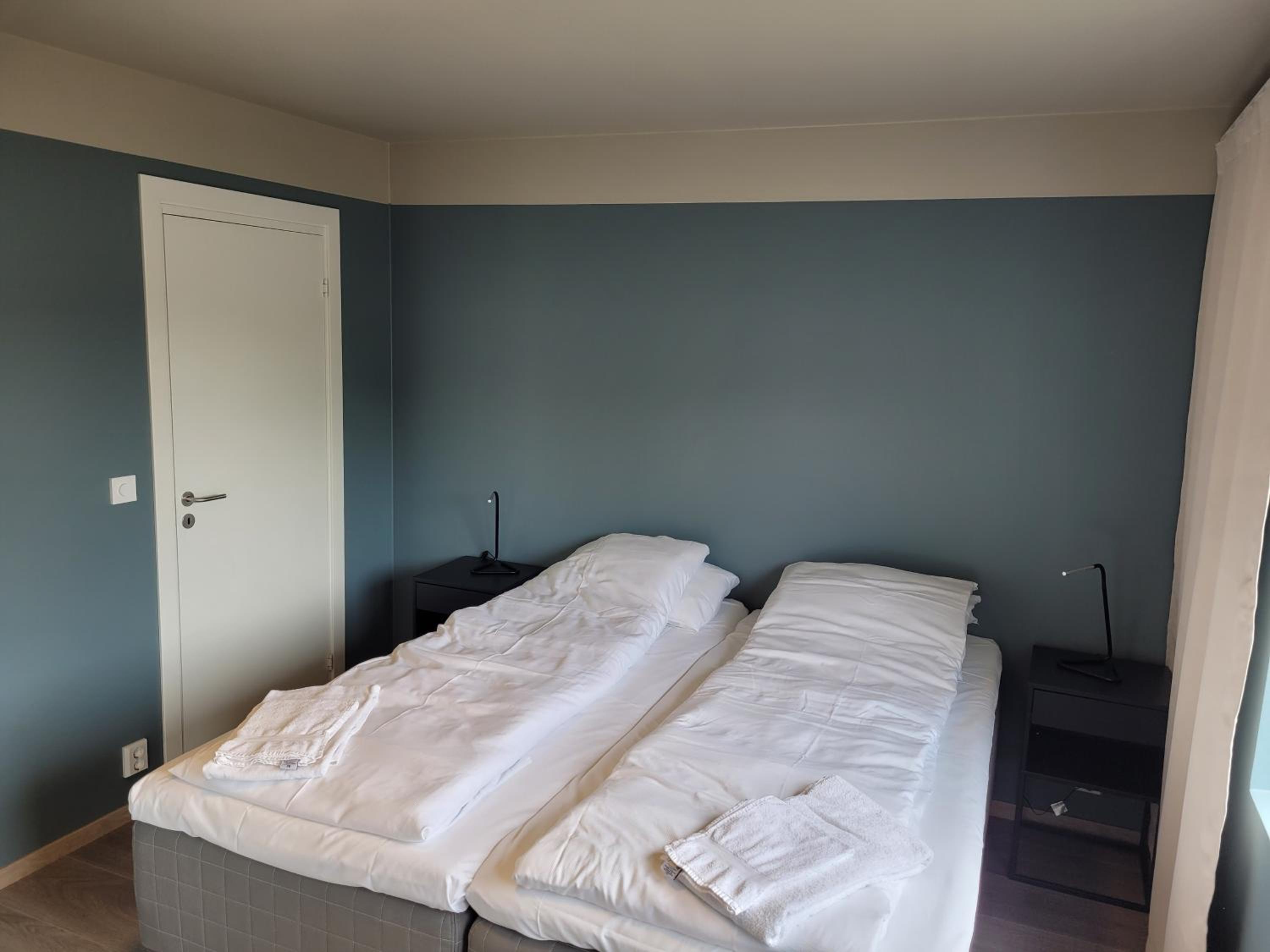 Three-Bedroom Apartment - Photo 2
