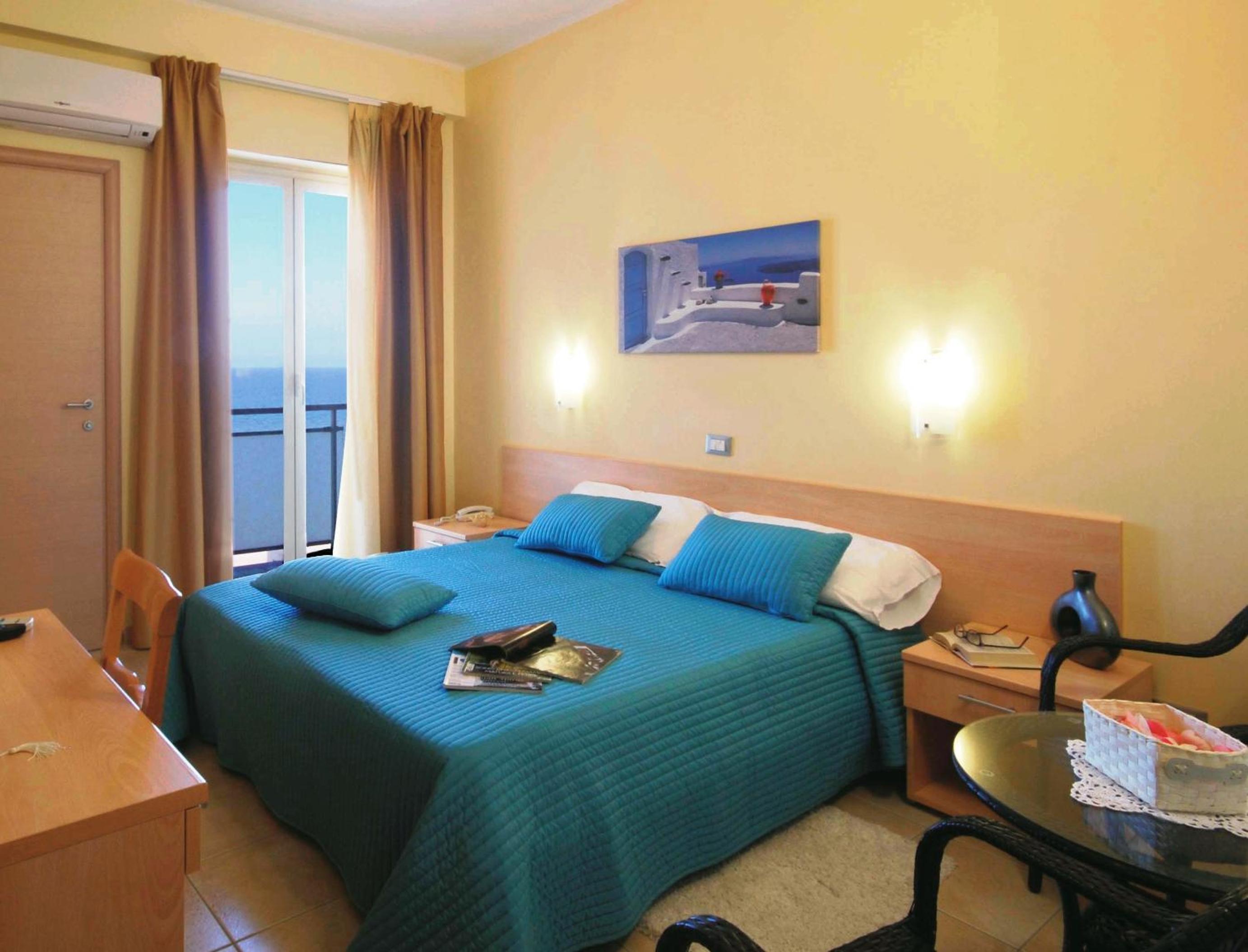 Quadruple Room with Balcony photo 3