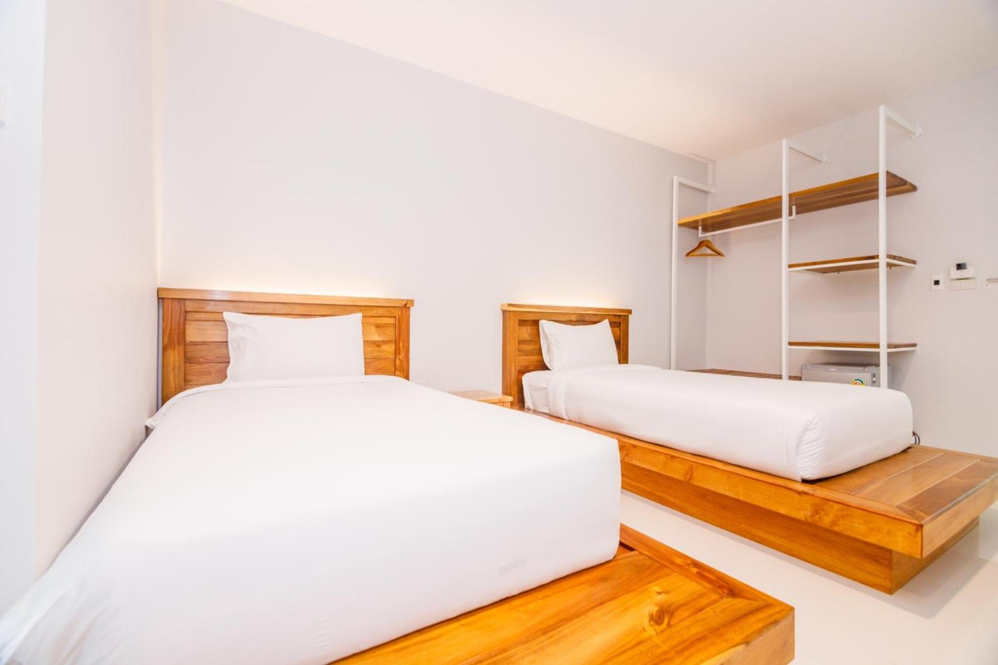 Twin Room - Photo 11