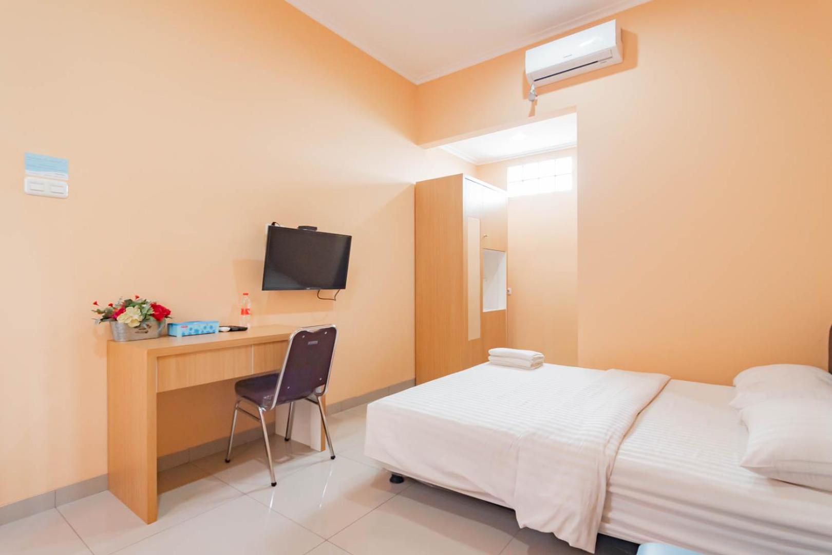 Deluxe Room - Photo 4