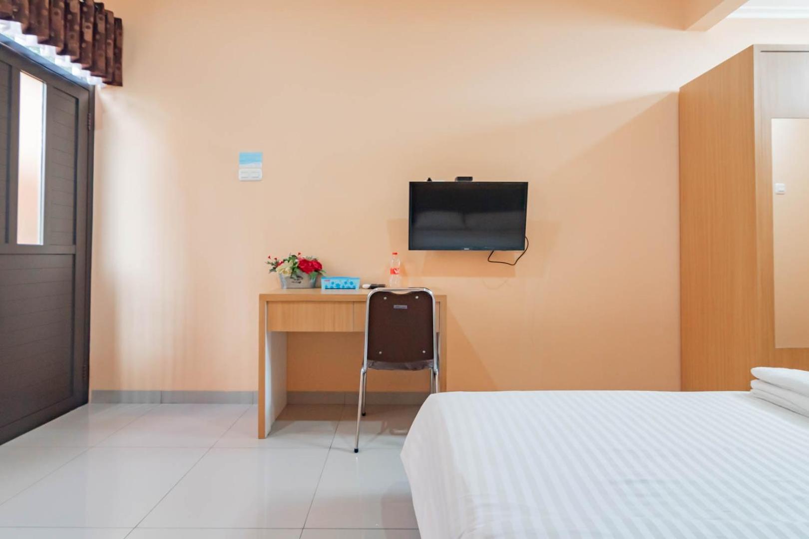 Deluxe Room - Photo 5