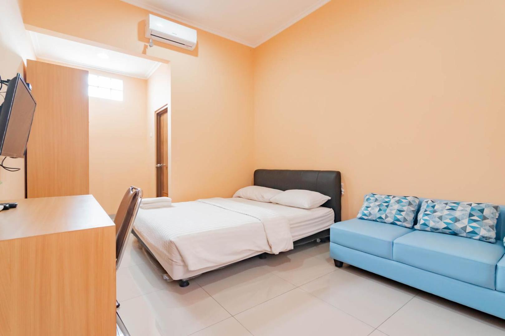 Deluxe Room - Photo 1