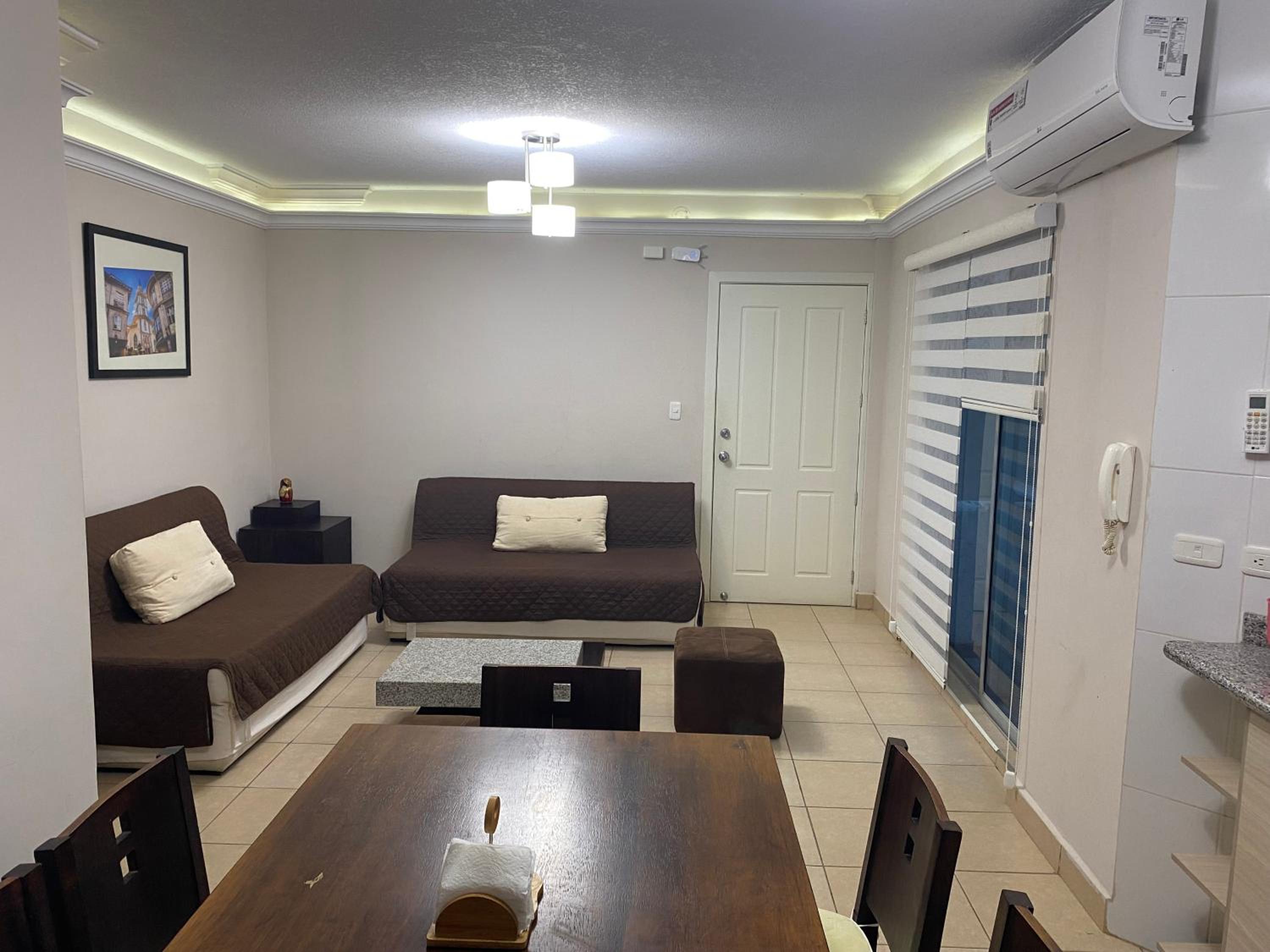 Three-Bedroom Apartment photo 1