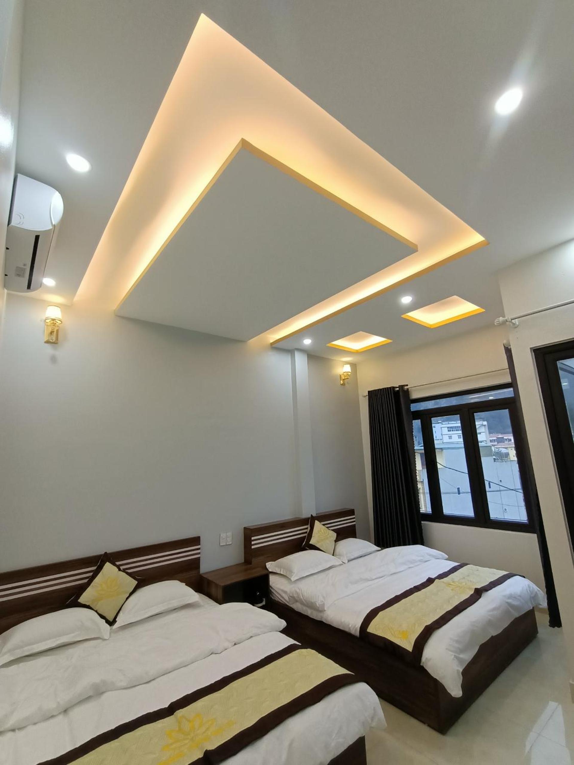 Quadruple Room with Balcony - Photo 1