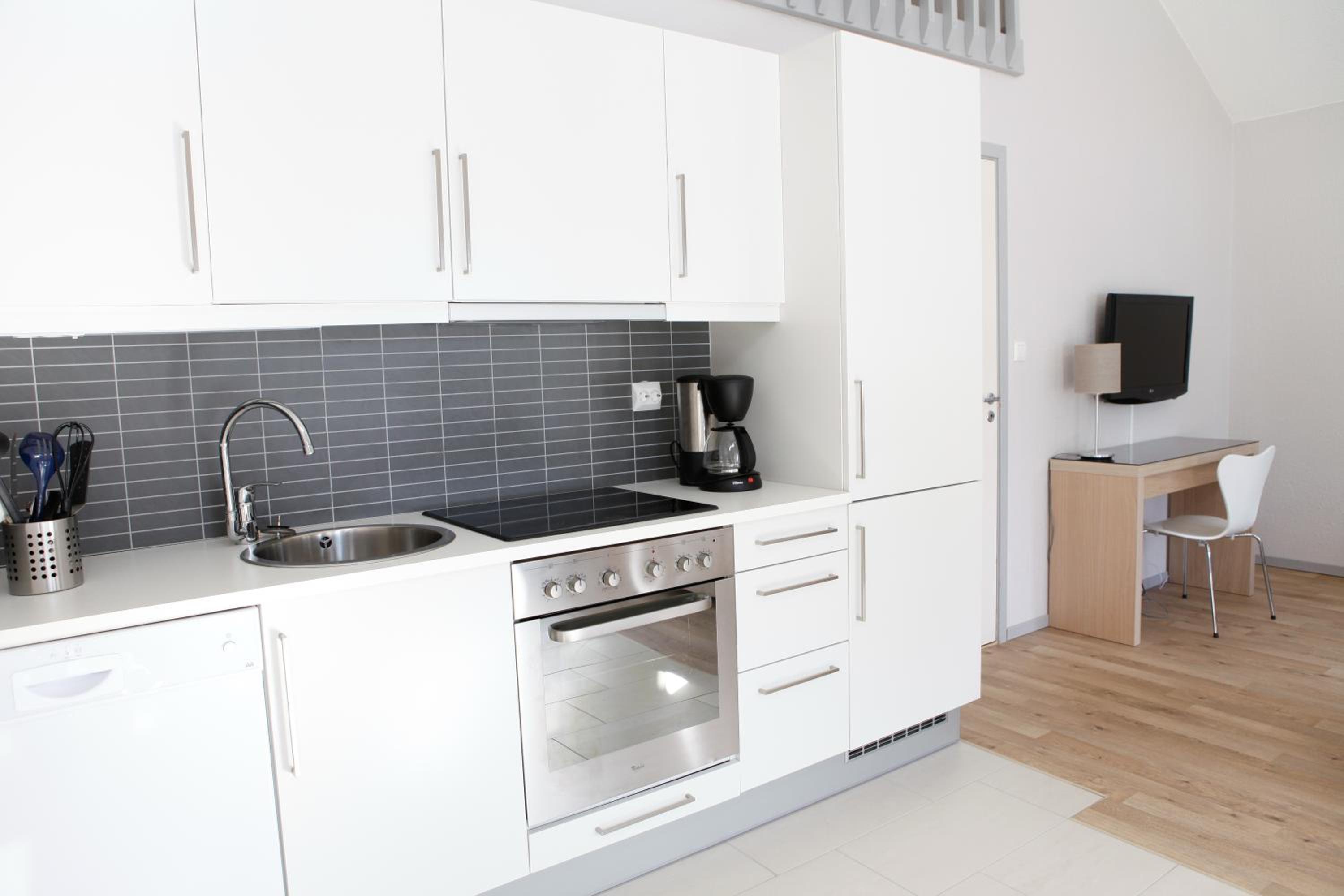 Three-Bedroom Apartment - Photo 5