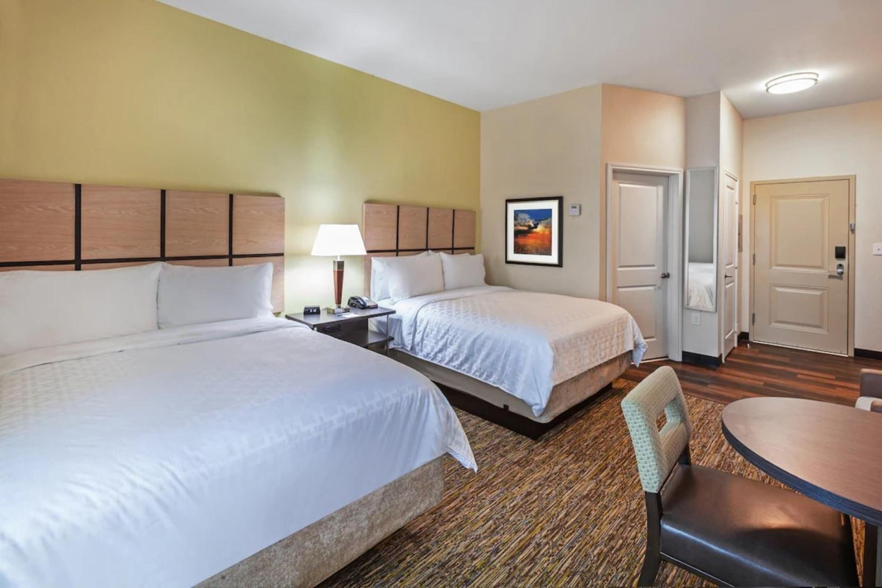 Queen Studio Suite with Two Queen Beds and Mobility Accessible Roll-In Shower, Full Kitchen, Sofa Bed