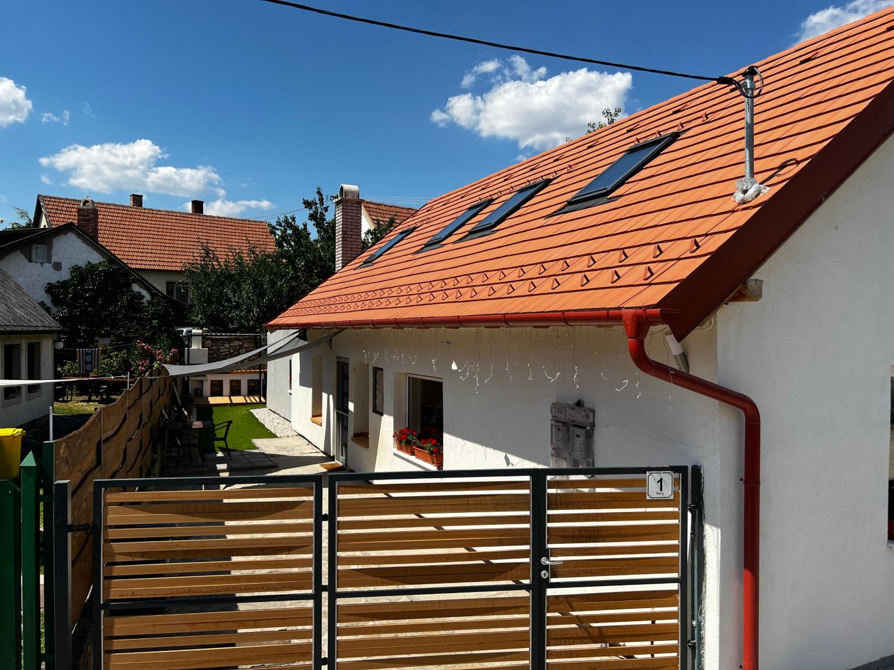 Three-Bedroom House - Photo 22