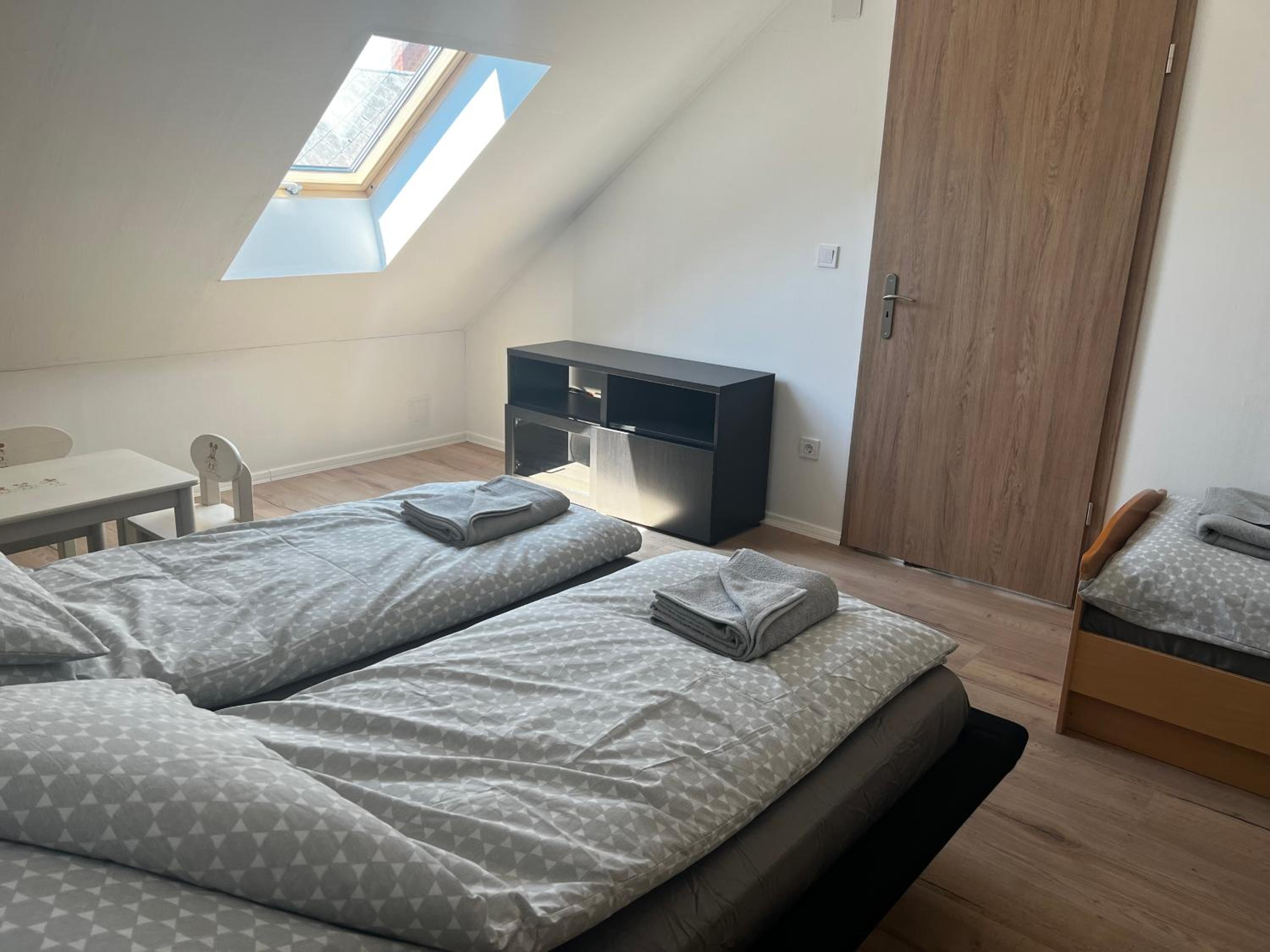 Three-Bedroom House - Photo 24